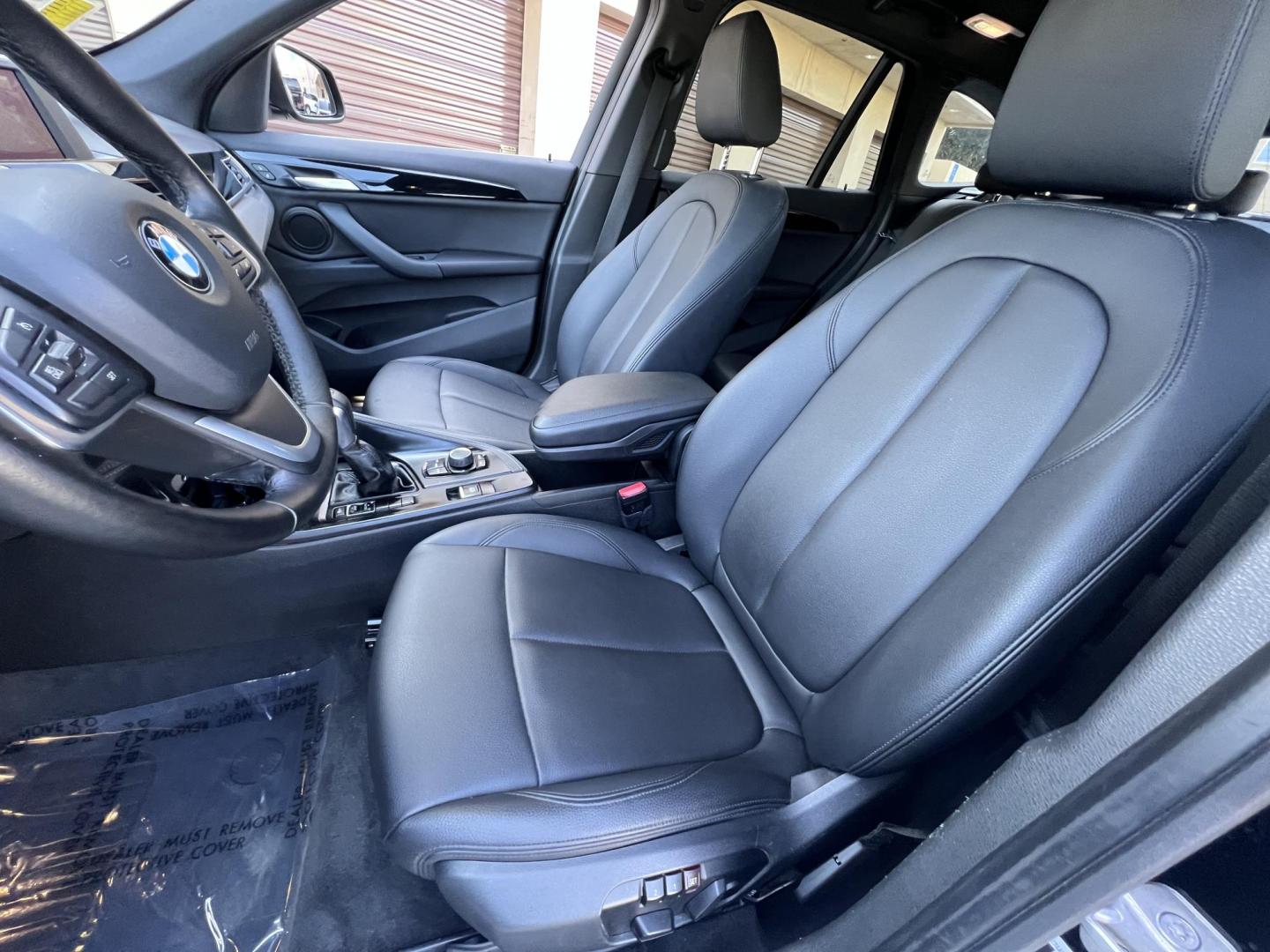 2018 BLACK /Black BMW X1 sDrive28i (WBXHU7C34J5) with an 2.0L L4 DOHC 16V engine, 8A transmission, located at 30 S. Berkeley Avenue, Pasadena, CA, 91107, (626) 248-7567, 34.145447, -118.109398 - 018 BMW X1 sDrive28i – Luxury, Performance and Affordability | Buy Here Pay Here – Pasadena, CA Step into luxury, style, and versatility with this 2018 BMW X1 sDrive28i, available now at Crown City Motors, Pasadena’s trusted Buy Here Pay Here (BHPH) dealership. Whether you're dealing with b - Photo#13