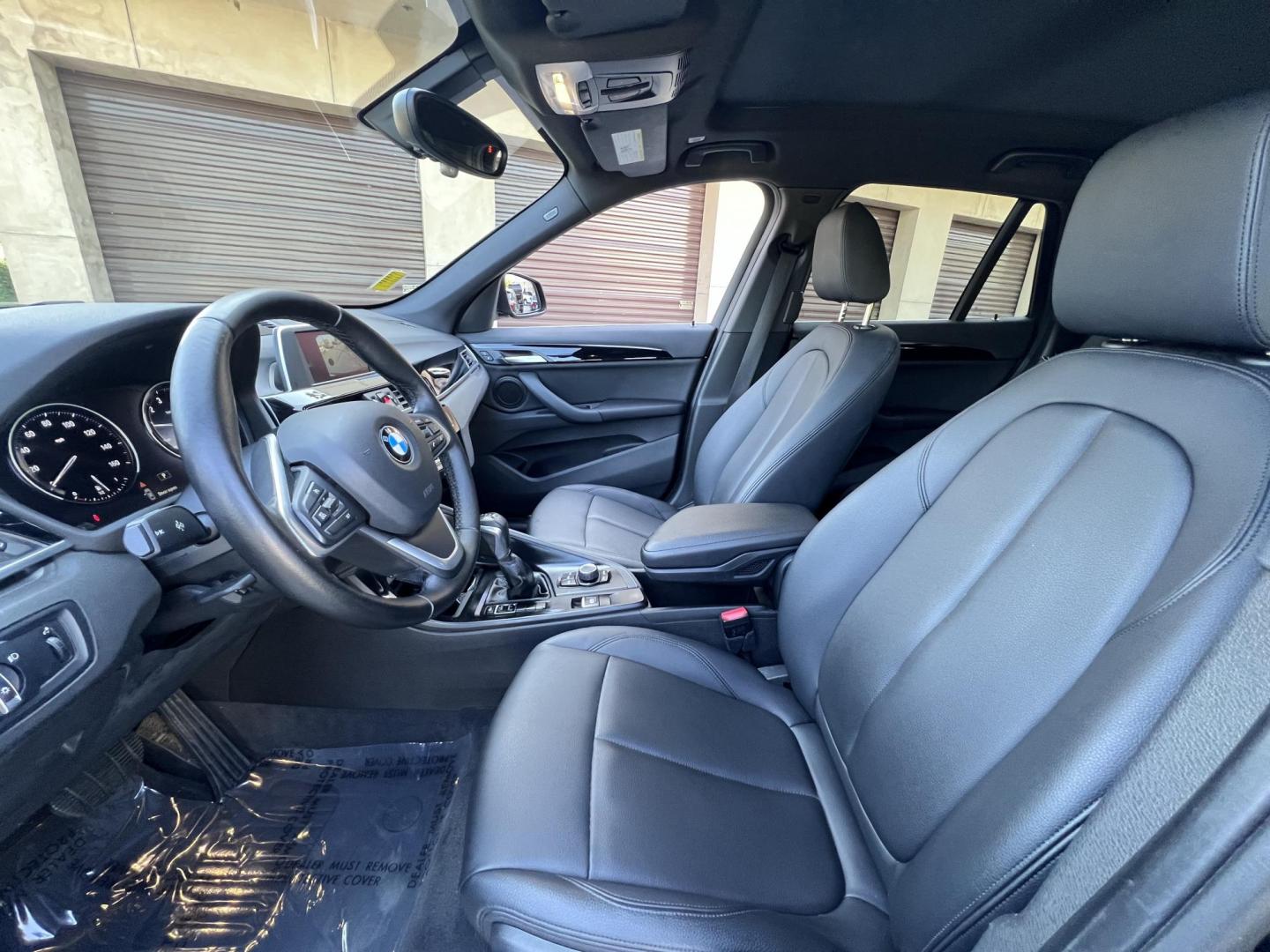 2018 BLACK /Black BMW X1 sDrive28i (WBXHU7C34J5) with an 2.0L L4 DOHC 16V engine, 8A transmission, located at 30 S. Berkeley Avenue, Pasadena, CA, 91107, (626) 248-7567, 34.145447, -118.109398 - 018 BMW X1 sDrive28i – Luxury, Performance and Affordability | Buy Here Pay Here – Pasadena, CA Step into luxury, style, and versatility with this 2018 BMW X1 sDrive28i, available now at Crown City Motors, Pasadena’s trusted Buy Here Pay Here (BHPH) dealership. Whether you're dealing with b - Photo#15