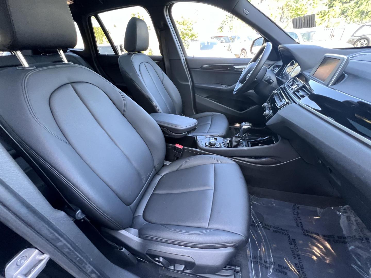2018 BLACK /Black BMW X1 sDrive28i (WBXHU7C34J5) with an 2.0L L4 DOHC 16V engine, 8A transmission, located at 30 S. Berkeley Avenue, Pasadena, CA, 91107, (626) 248-7567, 34.145447, -118.109398 - 018 BMW X1 sDrive28i – Luxury, Performance and Affordability | Buy Here Pay Here – Pasadena, CA Step into luxury, style, and versatility with this 2018 BMW X1 sDrive28i, available now at Crown City Motors, Pasadena’s trusted Buy Here Pay Here (BHPH) dealership. Whether you're dealing with b - Photo#17