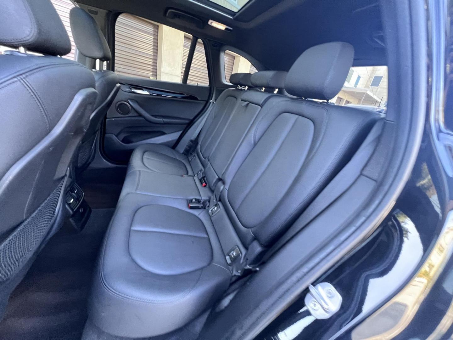2018 BLACK /Black BMW X1 sDrive28i (WBXHU7C34J5) with an 2.0L L4 DOHC 16V engine, 8A transmission, located at 30 S. Berkeley Avenue, Pasadena, CA, 91107, (626) 248-7567, 34.145447, -118.109398 - 018 BMW X1 sDrive28i – Luxury, Performance and Affordability | Buy Here Pay Here – Pasadena, CA Step into luxury, style, and versatility with this 2018 BMW X1 sDrive28i, available now at Crown City Motors, Pasadena’s trusted Buy Here Pay Here (BHPH) dealership. Whether you're dealing with b - Photo#20