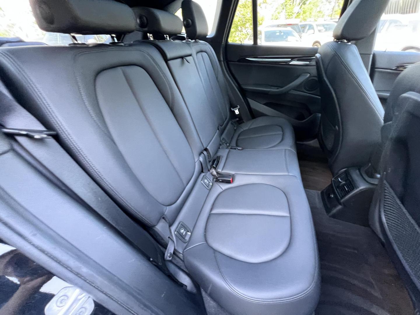 2018 BLACK /Black BMW X1 sDrive28i (WBXHU7C34J5) with an 2.0L L4 DOHC 16V engine, 8A transmission, located at 30 S. Berkeley Avenue, Pasadena, CA, 91107, (626) 248-7567, 34.145447, -118.109398 - 018 BMW X1 sDrive28i – Luxury, Performance and Affordability | Buy Here Pay Here – Pasadena, CA Step into luxury, style, and versatility with this 2018 BMW X1 sDrive28i, available now at Crown City Motors, Pasadena’s trusted Buy Here Pay Here (BHPH) dealership. Whether you're dealing with b - Photo#25