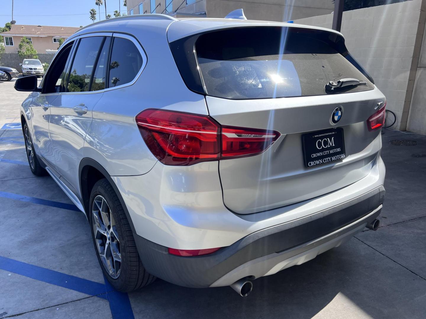 2018 Silver Metallic /Black BMW X1 sDrive28i (WBXHU7C34J5) with an 2.0L L4 DOHC 16V engine, 8A transmission, located at 30 S. Berkeley Avenue, Pasadena, CA, 91107, (626) 248-7567, 34.145447, -118.109398 - 2018 BMW X1 xDrive28i – Luxury, Performance, and Affordability in One SUV VIN: WBXHU7C34J5H42594 Location: Crown City Motors, Pasadena, CA Status: Available Now – Clean Title – Financing Options for All Credit Types Looking for a luxury crossover SUV that combines sporty performance, ele - Photo#2