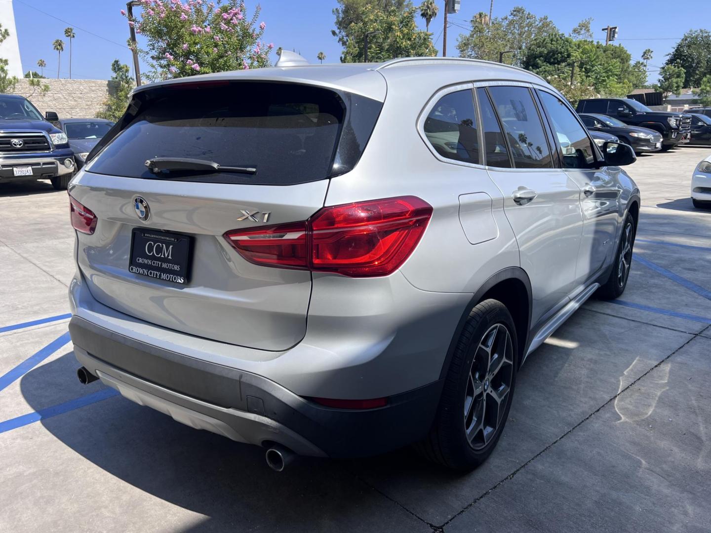 2018 Silver Metallic /Black BMW X1 sDrive28i (WBXHU7C34J5) with an 2.0L L4 DOHC 16V engine, 8A transmission, located at 30 S. Berkeley Avenue, Pasadena, CA, 91107, (626) 248-7567, 34.145447, -118.109398 - 2018 BMW X1 xDrive28i – Luxury, Performance, and Affordability in One SUV VIN: WBXHU7C34J5H42594 Location: Crown City Motors, Pasadena, CA Status: Available Now – Clean Title – Financing Options for All Credit Types Looking for a luxury crossover SUV that combines sporty performance, ele - Photo#4