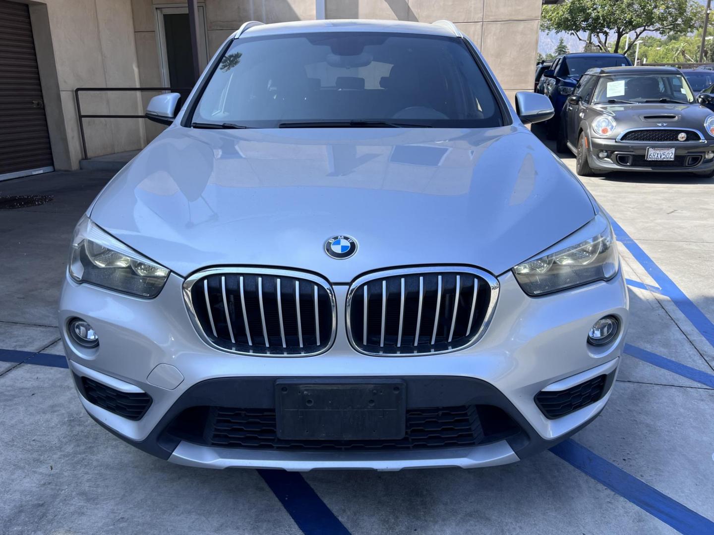 2018 Silver Metallic /Black BMW X1 sDrive28i (WBXHU7C34J5) with an 2.0L L4 DOHC 16V engine, 8A transmission, located at 30 S. Berkeley Avenue, Pasadena, CA, 91107, (626) 248-7567, 34.145447, -118.109398 - 2018 BMW X1 xDrive28i – Luxury, Performance, and Affordability in One SUV VIN: WBXHU7C34J5H42594 Location: Crown City Motors, Pasadena, CA Status: Available Now – Clean Title – Financing Options for All Credit Types Looking for a luxury crossover SUV that combines sporty performance, ele - Photo#6