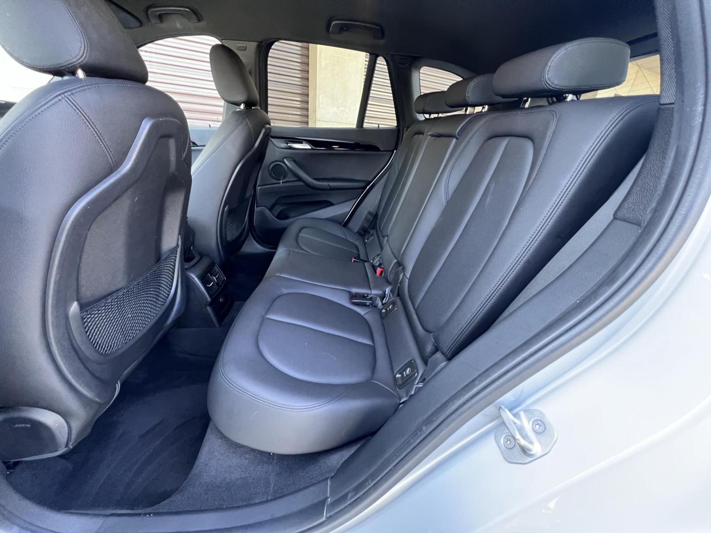2018 Silver Metallic /Black BMW X1 sDrive28i (WBXHU7C34J5) with an 2.0L L4 DOHC 16V engine, 8A transmission, located at 30 S. Berkeley Avenue, Pasadena, CA, 91107, (626) 248-7567, 34.145447, -118.109398 - 2018 BMW X1 xDrive28i – Luxury, Performance, and Affordability in One SUV VIN: WBXHU7C34J5H42594 Location: Crown City Motors, Pasadena, CA Status: Available Now – Clean Title – Financing Options for All Credit Types Looking for a luxury crossover SUV that combines sporty performance, ele - Photo#19