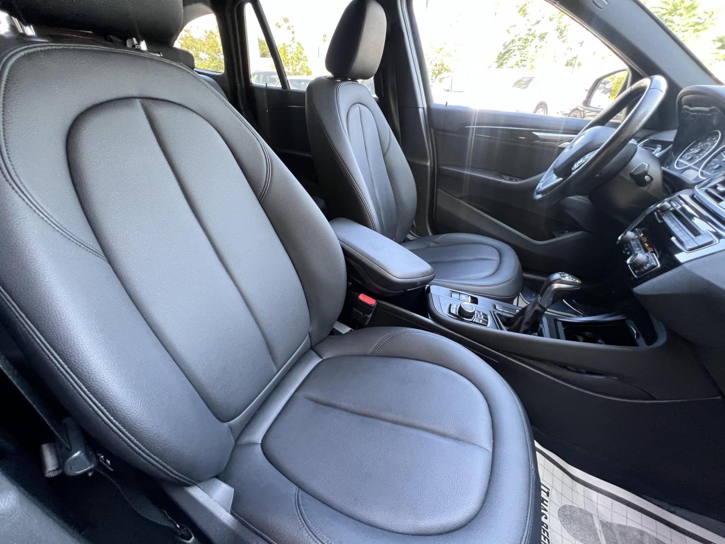 2018 Silver Metallic /Black BMW X1 sDrive28i (WBXHU7C34J5) with an 2.0L L4 DOHC 16V engine, 8A transmission, located at 30 S. Berkeley Avenue, Pasadena, CA, 91107, (626) 248-7567, 34.145447, -118.109398 - 2018 BMW X1 xDrive28i – Luxury, Performance, and Affordability in One SUV VIN: WBXHU7C34J5H42594 Location: Crown City Motors, Pasadena, CA Status: Available Now – Clean Title – Financing Options for All Credit Types Looking for a luxury crossover SUV that combines sporty performance, ele - Photo#24