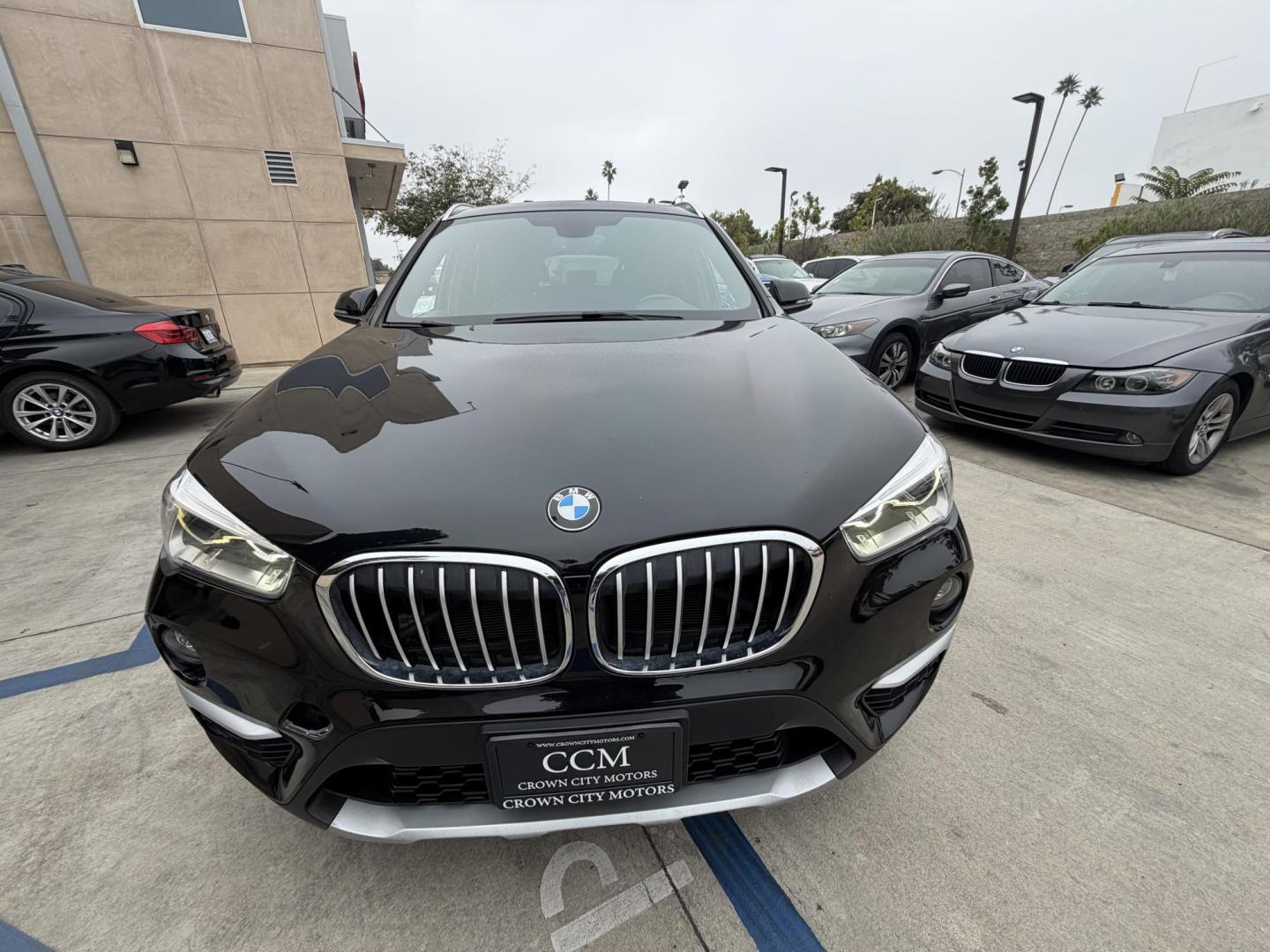 2018 Black BMW X1 xDrive28i (WBXHT3C33J5) with an 2.0L L4 DOHC 16V engine, 8A transmission, located at 30 S. Berkeley Avenue, Pasadena, CA, 91107, (626) 248-7567, 34.145447, -118.109398 - Crown City Motors is a used “Buy Here Pay Here” car dealer in Pasadena CA. “Buy Here Pay Here” financing, means that when you purchase your vehicle from our dealership, that you make the payments to the dealership as well. We do not need the banks approval to get you approved for a used auto - Photo#10