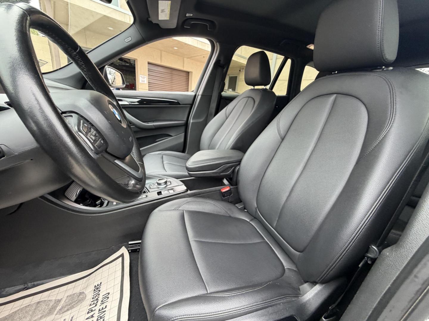 2018 Black BMW X1 xDrive28i (WBXHT3C33J5) with an 2.0L L4 DOHC 16V engine, 8A transmission, located at 30 S. Berkeley Avenue, Pasadena, CA, 91107, (626) 248-7567, 34.145447, -118.109398 - Crown City Motors is a used “Buy Here Pay Here” car dealer in Pasadena CA. “Buy Here Pay Here” financing, means that when you purchase your vehicle from our dealership, that you make the payments to the dealership as well. We do not need the banks approval to get you approved for a used auto - Photo#13