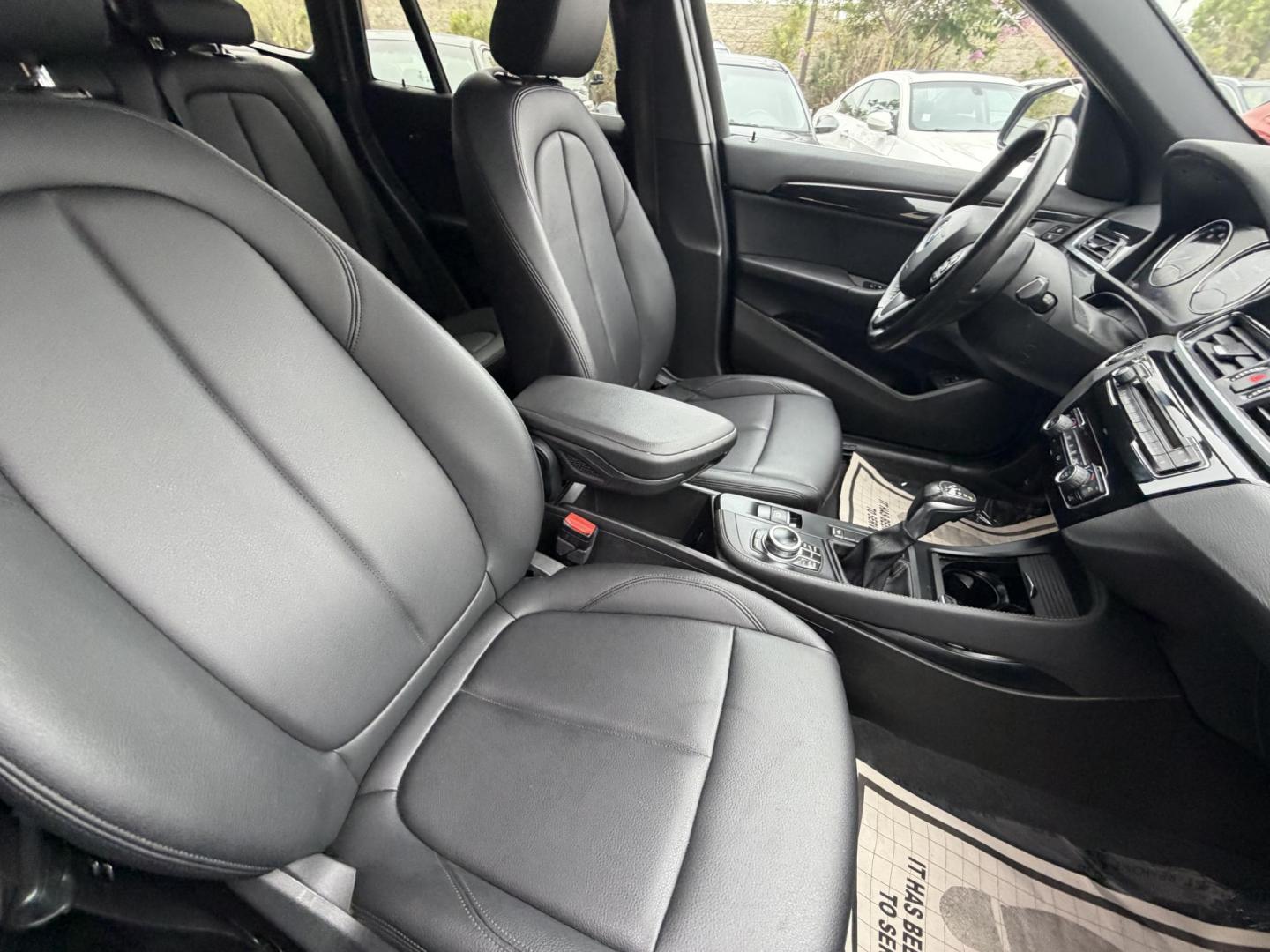 2018 Black BMW X1 xDrive28i (WBXHT3C33J5) with an 2.0L L4 DOHC 16V engine, 8A transmission, located at 30 S. Berkeley Avenue, Pasadena, CA, 91107, (626) 248-7567, 34.145447, -118.109398 - Crown City Motors is a used “Buy Here Pay Here” car dealer in Pasadena CA. “Buy Here Pay Here” financing, means that when you purchase your vehicle from our dealership, that you make the payments to the dealership as well. We do not need the banks approval to get you approved for a used auto - Photo#20