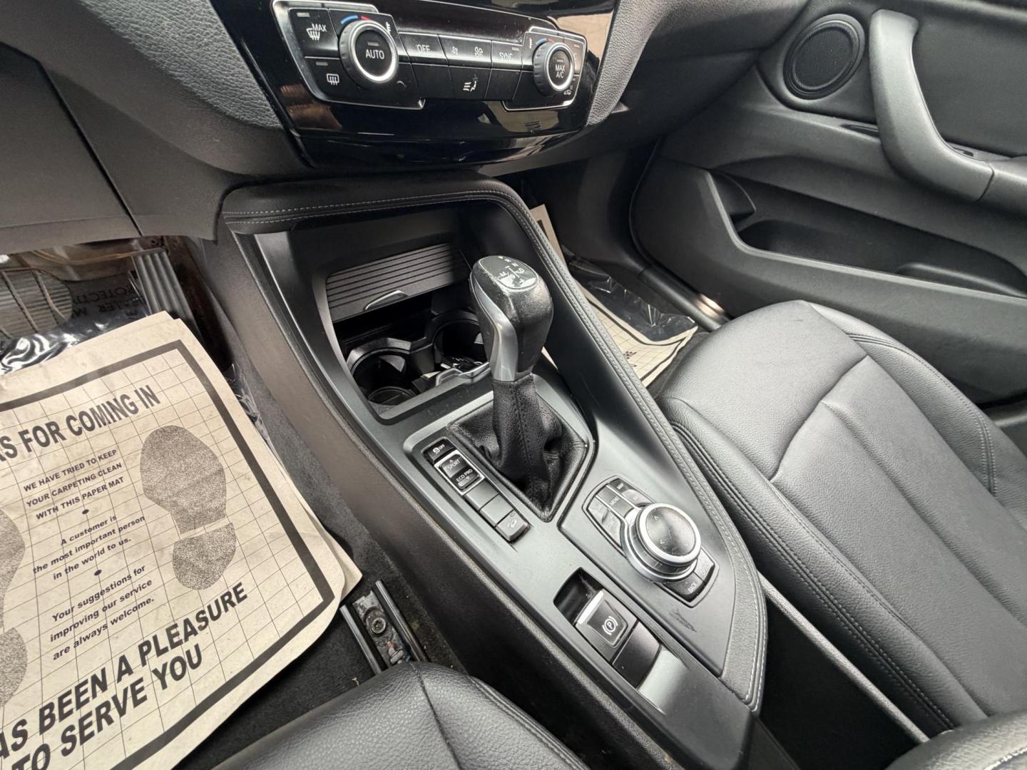 2018 Black BMW X1 xDrive28i (WBXHT3C33J5) with an 2.0L L4 DOHC 16V engine, 8A transmission, located at 30 S. Berkeley Avenue, Pasadena, CA, 91107, (626) 248-7567, 34.145447, -118.109398 - Crown City Motors is a used “Buy Here Pay Here” car dealer in Pasadena CA. “Buy Here Pay Here” financing, means that when you purchase your vehicle from our dealership, that you make the payments to the dealership as well. We do not need the banks approval to get you approved for a used auto - Photo#23