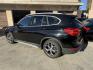 2018 Black /Black BMW X1 xDrive28i (WBXHT3C35J5) with an 2.0L L4 DOHC 16V engine, 8A transmission, located at 30 S. Berkeley Avenue, Pasadena, CA, 91107, (626) 248-7567, 34.145447, -118.109398 - BMW X1 – Black on Black – VIN: WBXHT3C35J5L28331 Luxury SUV with Buy Here Pay Here Financing – Crown City Motors, Pasadena If you’re looking for a luxury SUV with bad credit financing, this black on black BMW X3 is an excellent choice. Available now at Crown City Motors in Pasadena, th - Photo#2