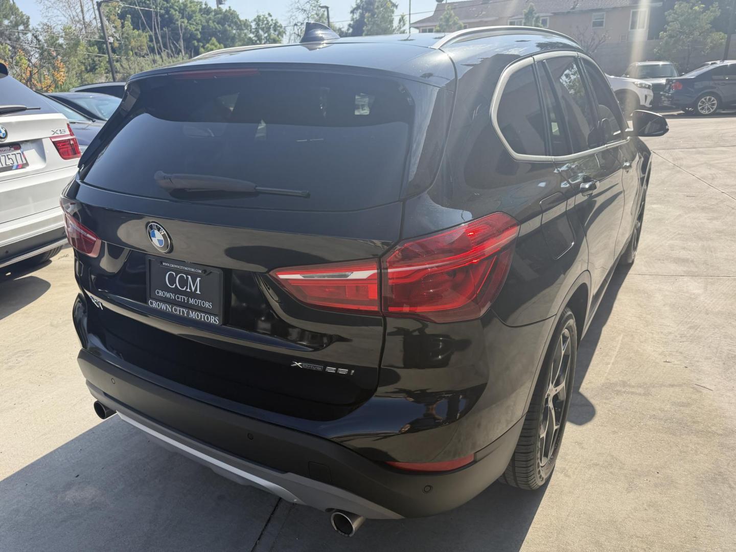 2018 Black /Black BMW X1 xDrive28i (WBXHT3C35J5) with an 2.0L L4 DOHC 16V engine, 8A transmission, located at 30 S. Berkeley Avenue, Pasadena, CA, 91107, (626) 248-7567, 34.145447, -118.109398 - BMW X1 – Black on Black – VIN: WBXHT3C35J5L28331 Luxury SUV with Buy Here Pay Here Financing – Crown City Motors, Pasadena If you’re looking for a luxury SUV with bad credit financing, this black on black BMW X3 is an excellent choice. Available now at Crown City Motors in Pasadena, th - Photo#4