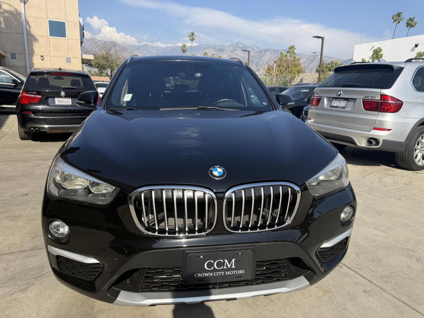2018 Black /Black BMW X1 xDrive28i (WBXHT3C35J5) with an 2.0L L4 DOHC 16V engine, 8A transmission, located at 30 S. Berkeley Avenue, Pasadena, CA, 91107, (626) 248-7567, 34.145447, -118.109398 - BMW X1 – Black on Black – VIN: WBXHT3C35J5L28331 Luxury SUV with Buy Here Pay Here Financing – Crown City Motors, Pasadena If you’re looking for a luxury SUV with bad credit financing, this black on black BMW X3 is an excellent choice. Available now at Crown City Motors in Pasadena, th - Photo#7