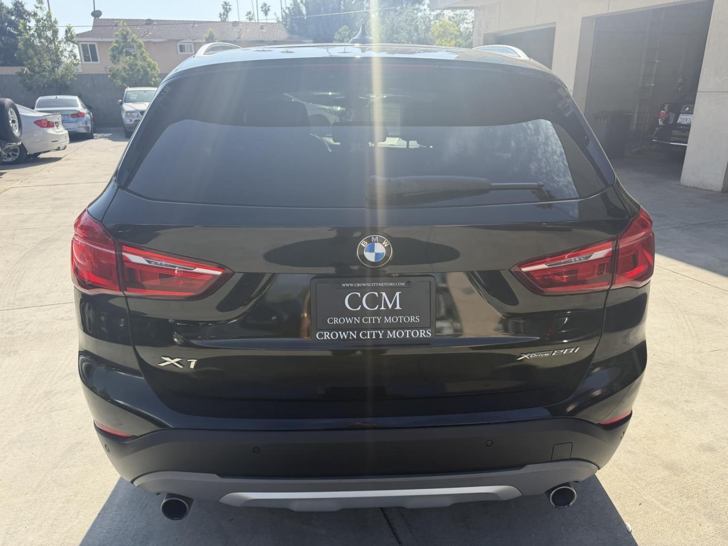 2018 Black /Black BMW X1 xDrive28i (WBXHT3C35J5) with an 2.0L L4 DOHC 16V engine, 8A transmission, located at 30 S. Berkeley Avenue, Pasadena, CA, 91107, (626) 248-7567, 34.145447, -118.109398 - BMW X1 – Black on Black – VIN: WBXHT3C35J5L28331 Luxury SUV with Buy Here Pay Here Financing – Crown City Motors, Pasadena If you’re looking for a luxury SUV with bad credit financing, this black on black BMW X3 is an excellent choice. Available now at Crown City Motors in Pasadena, th - Photo#9