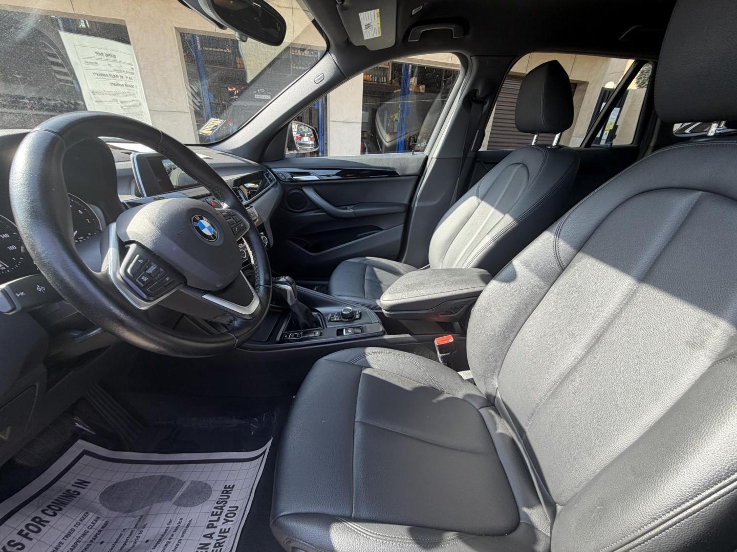 2018 Black /Black BMW X1 xDrive28i (WBXHT3C35J5) with an 2.0L L4 DOHC 16V engine, 8A transmission, located at 30 S. Berkeley Avenue, Pasadena, CA, 91107, (626) 248-7567, 34.145447, -118.109398 - BMW X1 – Black on Black – VIN: WBXHT3C35J5L28331 Luxury SUV with Buy Here Pay Here Financing – Crown City Motors, Pasadena If you’re looking for a luxury SUV with bad credit financing, this black on black BMW X3 is an excellent choice. Available now at Crown City Motors in Pasadena, th - Photo#14