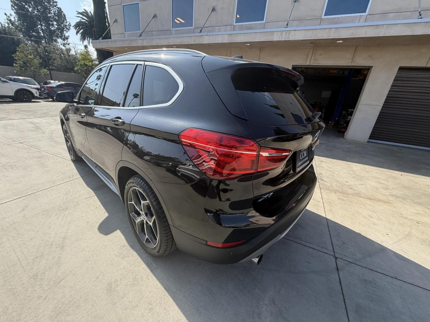 2018 Black /Black BMW X1 xDrive28i (WBXHT3C35J5) with an 2.0L L4 DOHC 16V engine, 8A transmission, located at 30 S. Berkeley Avenue, Pasadena, CA, 91107, (626) 248-7567, 34.145447, -118.109398 - BMW X1 – Black on Black – VIN: WBXHT3C35J5L28331 Luxury SUV with Buy Here Pay Here Financing – Crown City Motors, Pasadena If you’re looking for a luxury SUV with bad credit financing, this black on black BMW X3 is an excellent choice. Available now at Crown City Motors in Pasadena, th - Photo#15