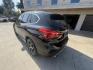 2018 Black /Black BMW X1 xDrive28i (WBXHT3C35J5) with an 2.0L L4 DOHC 16V engine, 8A transmission, located at 30 S. Berkeley Avenue, Pasadena, CA, 91107, (626) 248-7567, 34.145447, -118.109398 - BMW X1 – Black on Black – VIN: WBXHT3C35J5L28331 Luxury SUV with Buy Here Pay Here Financing – Crown City Motors, Pasadena If you’re looking for a luxury SUV with bad credit financing, this black on black BMW X3 is an excellent choice. Available now at Crown City Motors in Pasadena, th - Photo#15