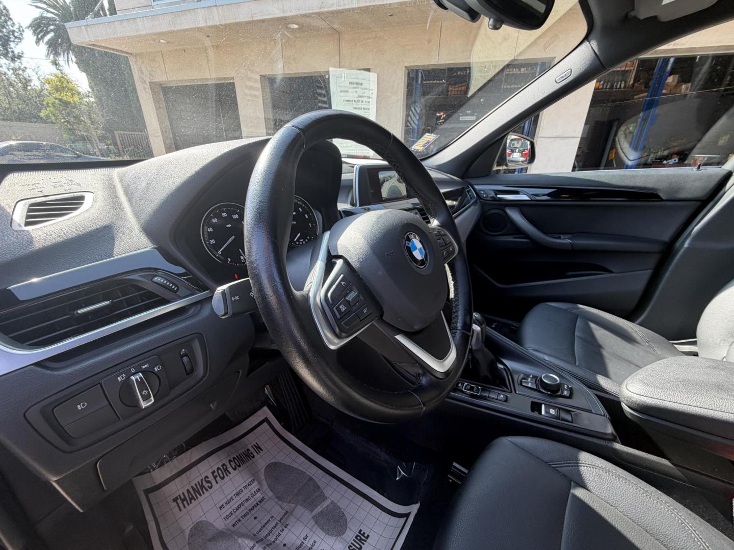 2018 Black /Black BMW X1 xDrive28i (WBXHT3C35J5) with an 2.0L L4 DOHC 16V engine, 8A transmission, located at 30 S. Berkeley Avenue, Pasadena, CA, 91107, (626) 248-7567, 34.145447, -118.109398 - BMW X1 – Black on Black – VIN: WBXHT3C35J5L28331 Luxury SUV with Buy Here Pay Here Financing – Crown City Motors, Pasadena If you’re looking for a luxury SUV with bad credit financing, this black on black BMW X3 is an excellent choice. Available now at Crown City Motors in Pasadena, th - Photo#17