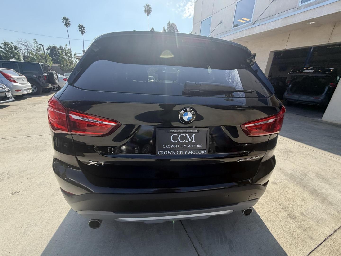 2018 Black /Black BMW X1 xDrive28i (WBXHT3C35J5) with an 2.0L L4 DOHC 16V engine, 8A transmission, located at 30 S. Berkeley Avenue, Pasadena, CA, 91107, (626) 248-7567, 34.145447, -118.109398 - BMW X1 – Black on Black – VIN: WBXHT3C35J5L28331 Luxury SUV with Buy Here Pay Here Financing – Crown City Motors, Pasadena If you’re looking for a luxury SUV with bad credit financing, this black on black BMW X3 is an excellent choice. Available now at Crown City Motors in Pasadena, th - Photo#16
