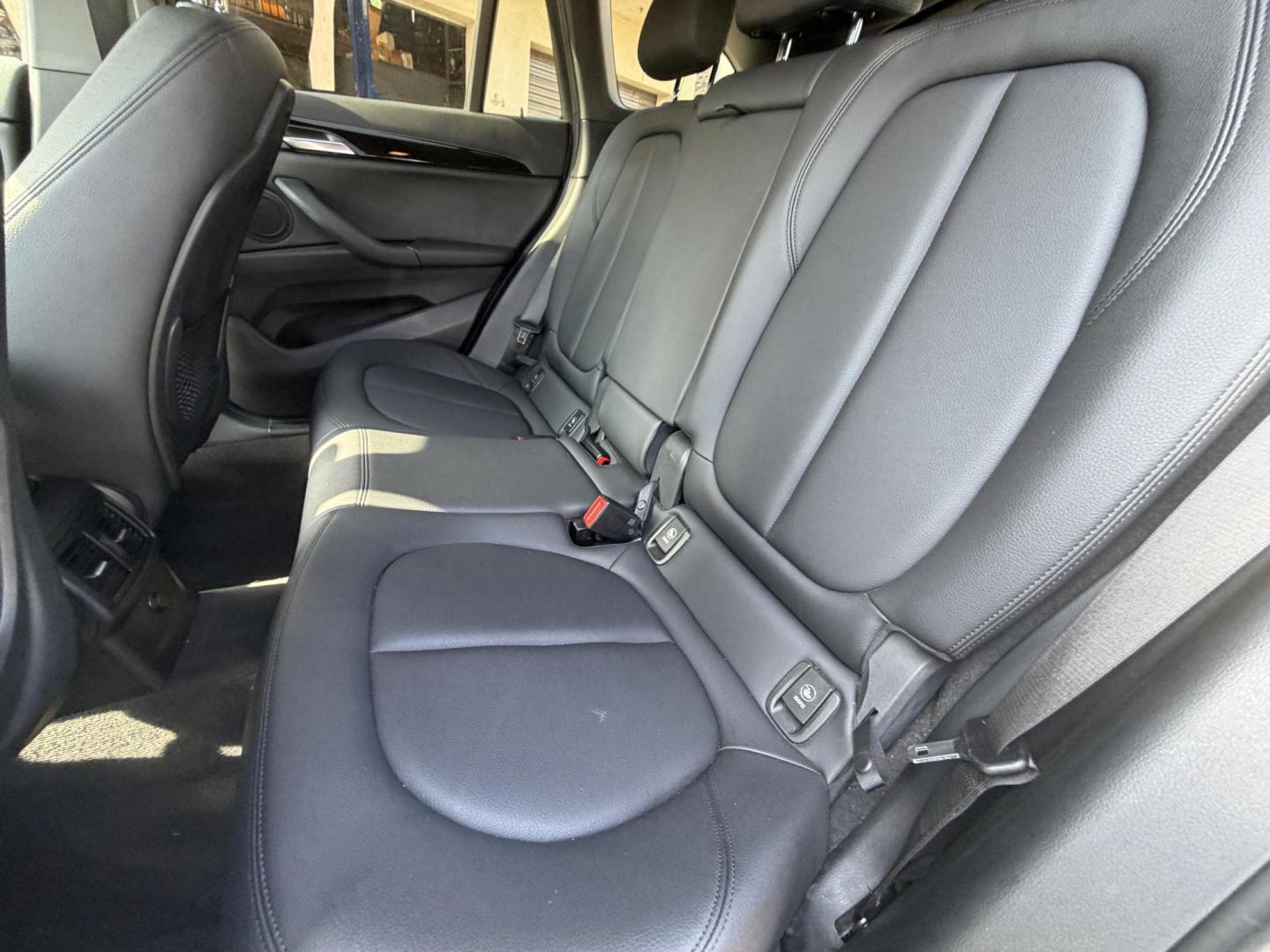 2018 Black /Black BMW X1 xDrive28i (WBXHT3C35J5) with an 2.0L L4 DOHC 16V engine, 8A transmission, located at 30 S. Berkeley Avenue, Pasadena, CA, 91107, (626) 248-7567, 34.145447, -118.109398 - BMW X1 – Black on Black – VIN: WBXHT3C35J5L28331 Luxury SUV with Buy Here Pay Here Financing – Crown City Motors, Pasadena If you’re looking for a luxury SUV with bad credit financing, this black on black BMW X3 is an excellent choice. Available now at Crown City Motors in Pasadena, th - Photo#18