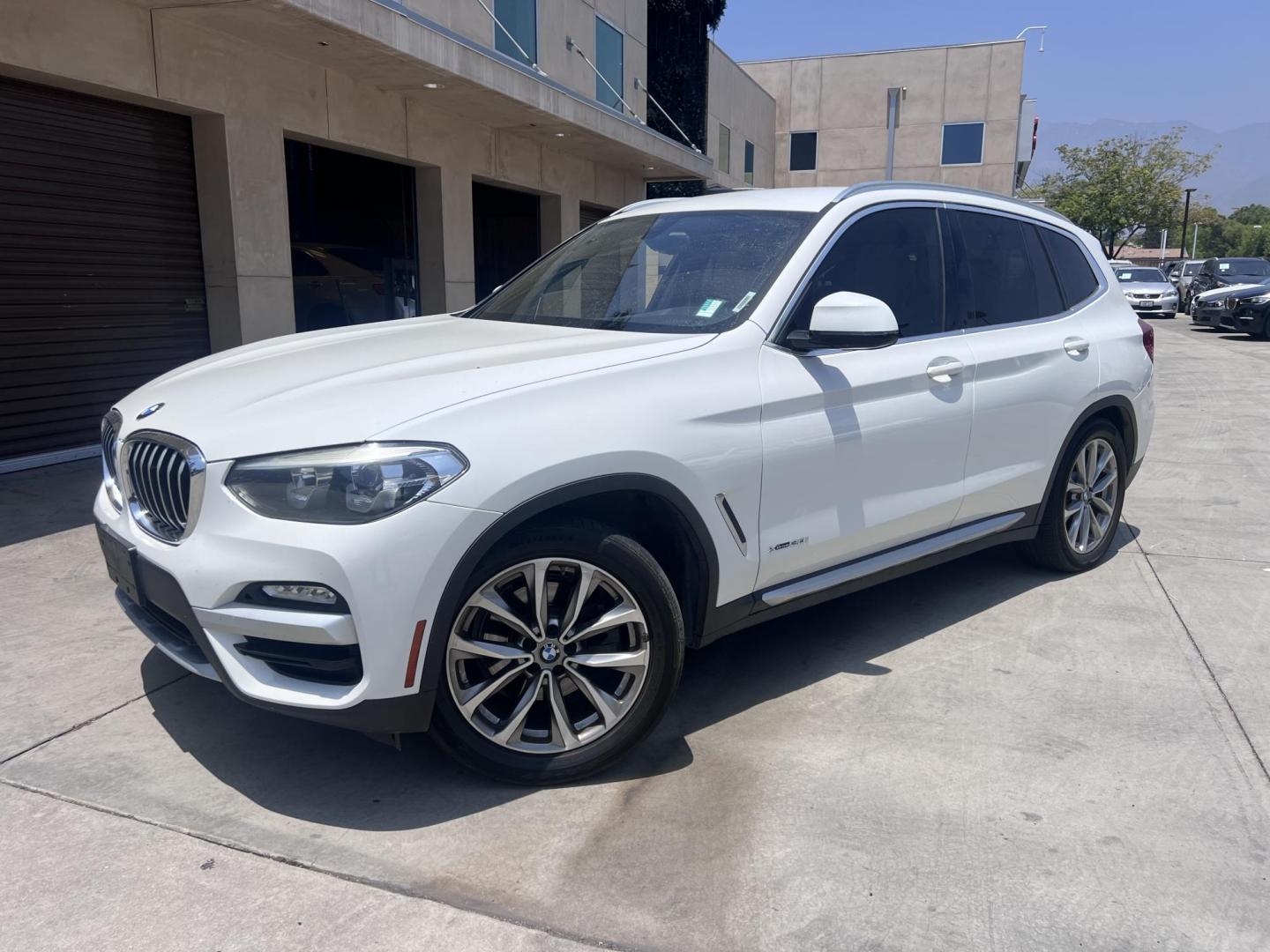 2018 Alpine White /Black BMW X3 xDrive30i (5UXTR9C56JL) with an 2.0L L4 DOHC 16V engine, 8A transmission, located at 30 S. Berkeley Avenue, Pasadena, CA, 91107, (626) 248-7567, 34.145447, -118.109398 - Photo#0
