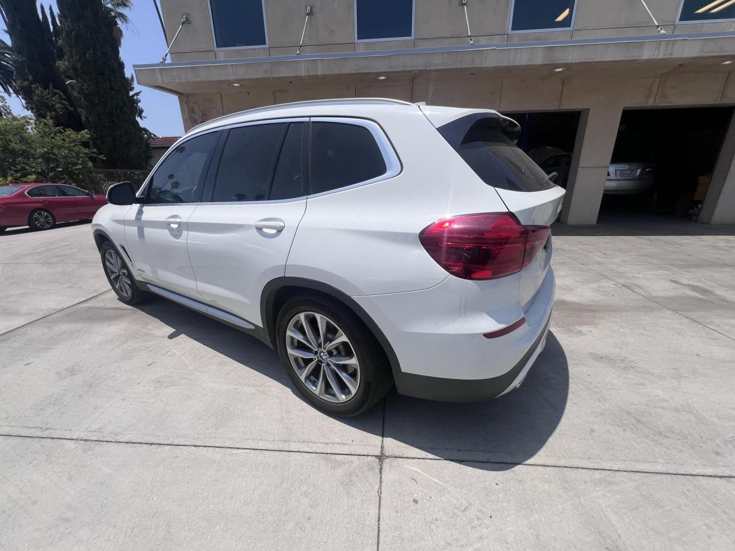 2018 Alpine White /Black BMW X3 xDrive30i (5UXTR9C56JL) with an 2.0L L4 DOHC 16V engine, 8A transmission, located at 30 S. Berkeley Avenue, Pasadena, CA, 91107, (626) 248-7567, 34.145447, -118.109398 - Photo#2