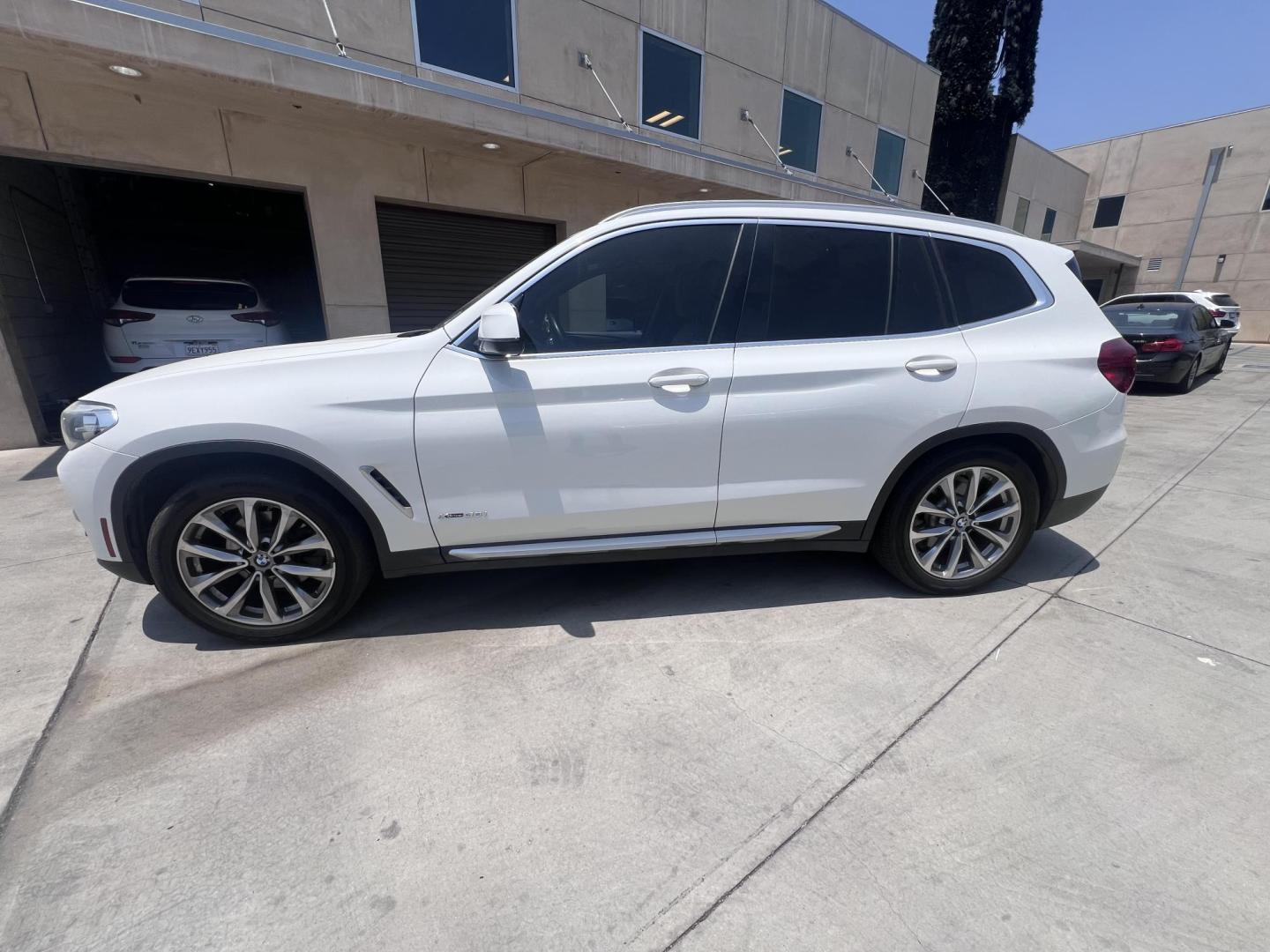 2018 Alpine White /Black BMW X3 xDrive30i (5UXTR9C56JL) with an 2.0L L4 DOHC 16V engine, 8A transmission, located at 30 S. Berkeley Avenue, Pasadena, CA, 91107, (626) 248-7567, 34.145447, -118.109398 - Photo#1