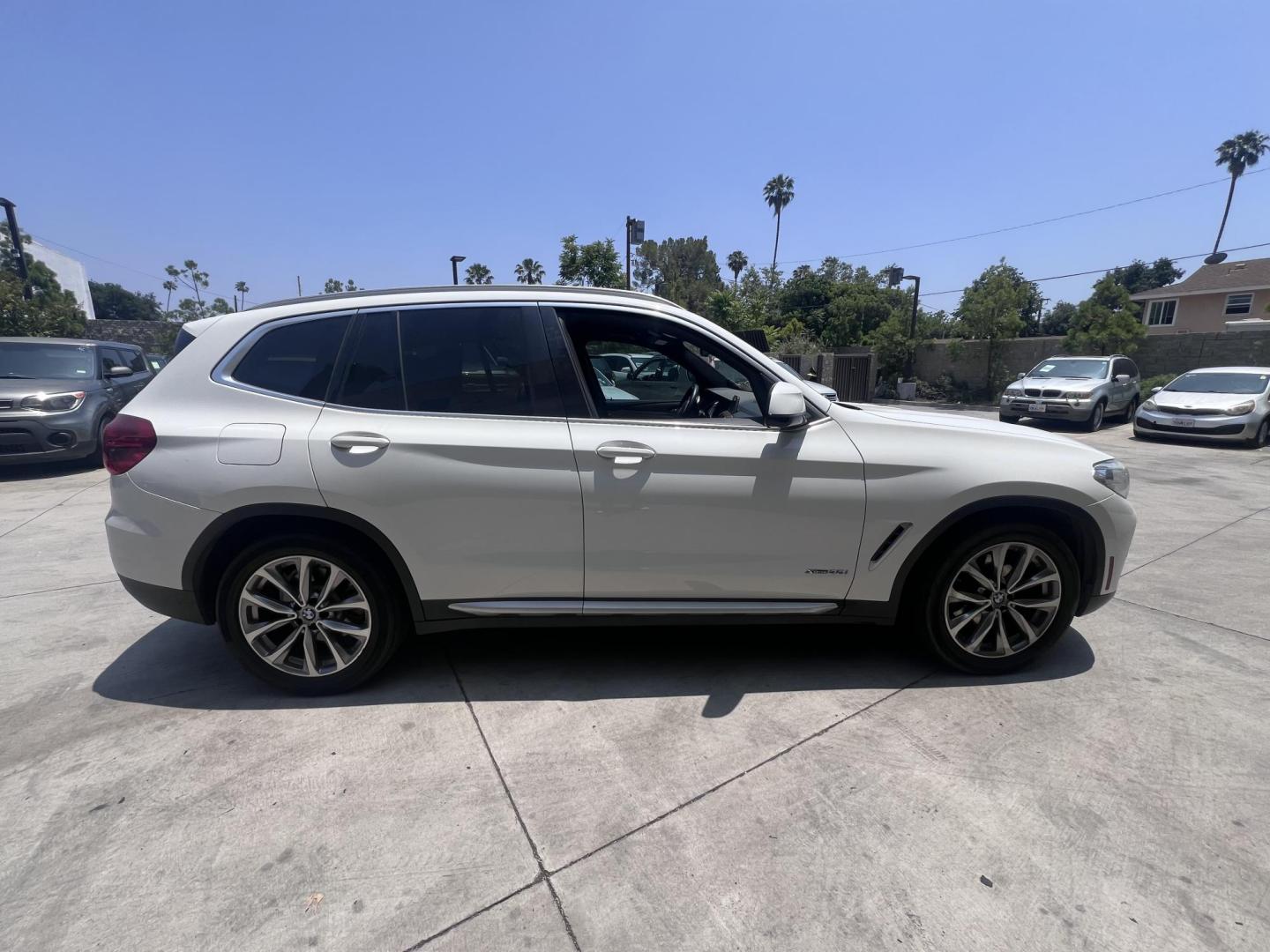 2018 Alpine White /Black BMW X3 xDrive30i (5UXTR9C56JL) with an 2.0L L4 DOHC 16V engine, 8A transmission, located at 30 S. Berkeley Avenue, Pasadena, CA, 91107, (626) 248-7567, 34.145447, -118.109398 - Photo#4