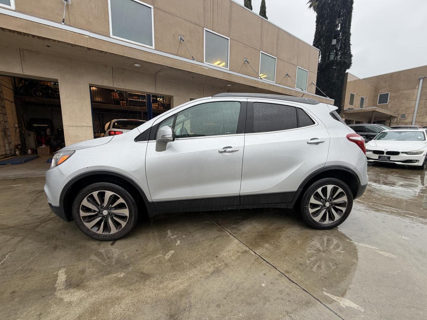 2018 Silver Buick Encore Essence AWD (KL4CJGSB7JB) with an 1.4L L4 DOHC 16V TURBO engine, 6A transmission, located at 30 S. Berkeley Avenue, Pasadena, CA, 91107, (626) 248-7567, 34.145447, -118.109398 - 2018 Buick Encore – Luxury Compact SUV – Easy Financing Available at Crown City Motors – Apply Online Today If you’re looking for a reliable, fuel-efficient, and luxury-inspired SUV with affordable Buy Here Pay Here financing, this 2018 Buick Encore is the perfect choice. At Crown City Mo - Photo#1