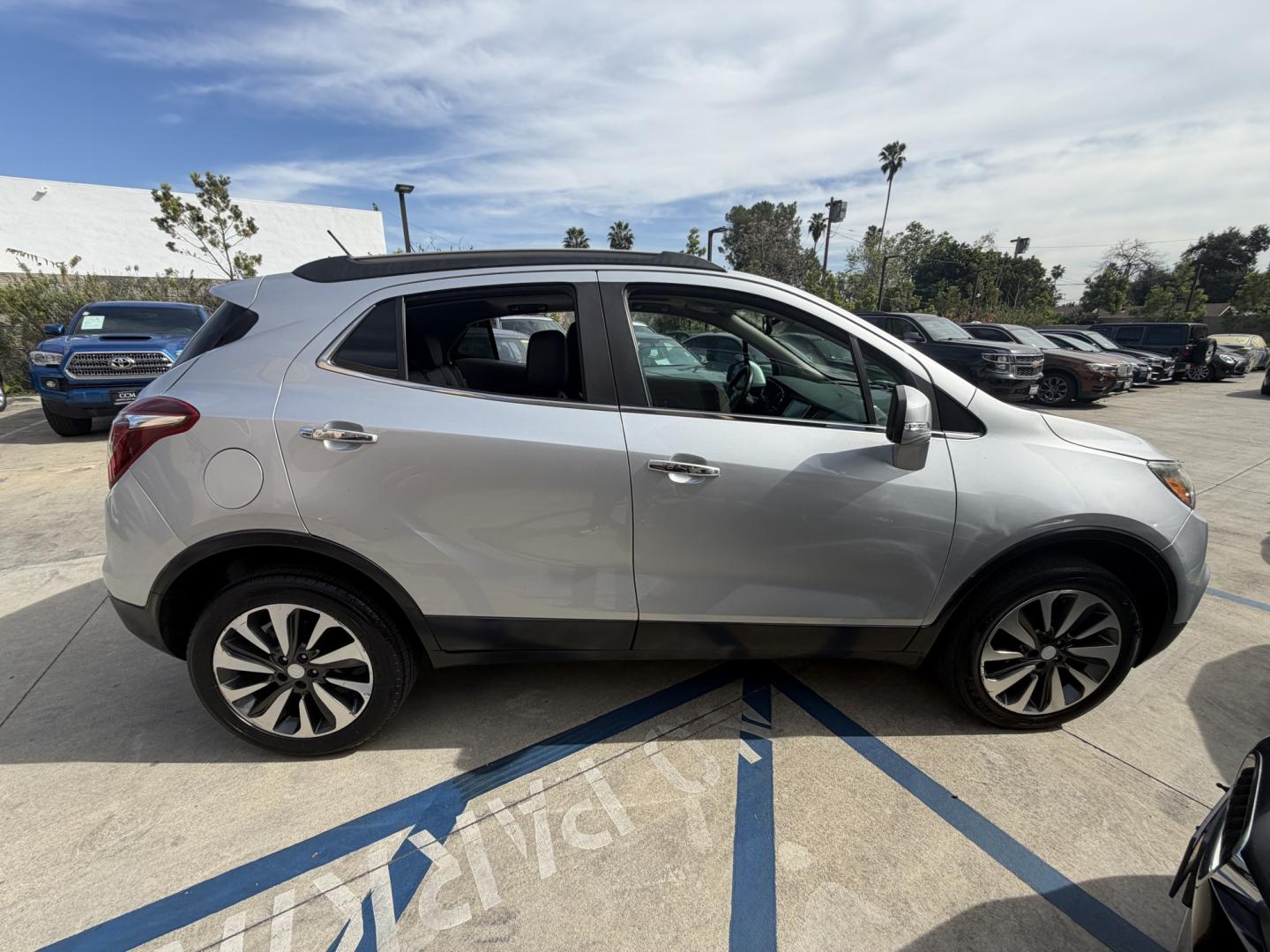 2018 Silver Buick Encore Essence AWD (KL4CJGSB7JB) with an 1.4L L4 DOHC 16V TURBO engine, 6A transmission, located at 30 S. Berkeley Avenue, Pasadena, CA, 91107, (626) 248-7567, 34.145447, -118.109398 - 2018 Buick Encore – Luxury Compact SUV – Easy Financing Available at Crown City Motors – Apply Online Today If you’re looking for a reliable, fuel-efficient, and luxury-inspired SUV with affordable Buy Here Pay Here financing, this 2018 Buick Encore is the perfect choice. At Crown City Mo - Photo#10