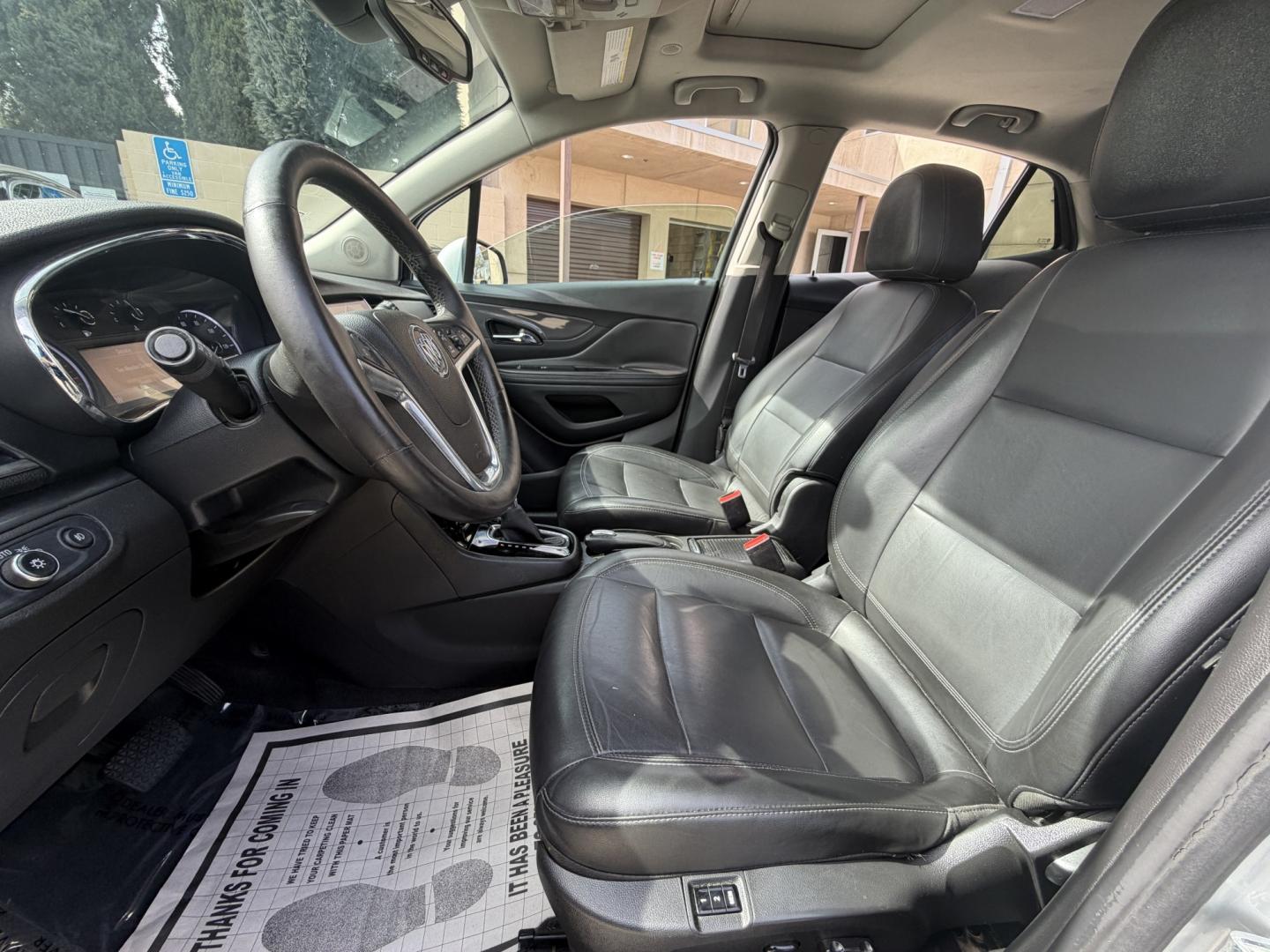 2018 Silver Buick Encore Essence AWD (KL4CJGSB7JB) with an 1.4L L4 DOHC 16V TURBO engine, 6A transmission, located at 30 S. Berkeley Avenue, Pasadena, CA, 91107, (626) 248-7567, 34.145447, -118.109398 - 2018 Buick Encore – Luxury Compact SUV – Easy Financing Available at Crown City Motors – Apply Online Today If you’re looking for a reliable, fuel-efficient, and luxury-inspired SUV with affordable Buy Here Pay Here financing, this 2018 Buick Encore is the perfect choice. At Crown City Mo - Photo#8