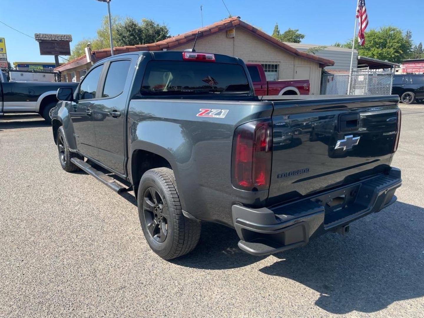 2018 Deepwood Green Metallic Chevrolet Colorado Z71 (1GCPTDE13J1) with an 0.0 Duramax 2.8L Diesel Turbo I4 181hp 369ft. lbs. Common Rail Direct Injection engine, 8-Speed Shiftable Automatic transmission, located at 800 Riverside Ave, Roseville, CA, 95678, 916-773-4549 & Toll Free: 866-719-4393, 38.732265, -121.291039 - DIESEL CREW CAB 4X4 Z-71 ONE OWNER - Photo#2