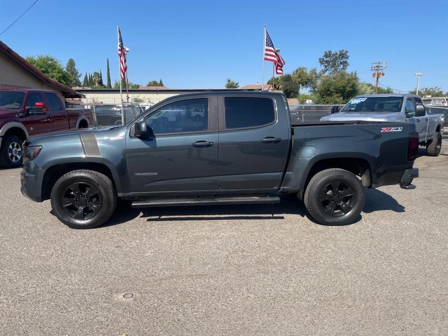 2018 Deepwood Green Metallic Chevrolet Colorado Z71 (1GCPTDE13J1) with an 0.0 Duramax 2.8L Diesel Turbo I4 181hp 369ft. lbs. Common Rail Direct Injection engine, 8-Speed Shiftable Automatic transmission, located at 800 Riverside Ave, Roseville, CA, 95678, 916-773-4549 & Toll Free: 866-719-4393, 38.732265, -121.291039 - DIESEL CREW CAB 4X4 Z-71 ONE OWNER - Photo#4