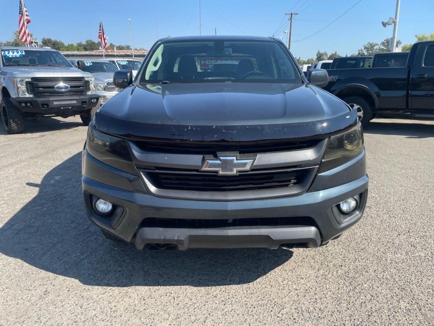 2018 Deepwood Green Metallic Chevrolet Colorado Z71 (1GCPTDE13J1) with an 0.0 Duramax 2.8L Diesel Turbo I4 181hp 369ft. lbs. Common Rail Direct Injection engine, 8-Speed Shiftable Automatic transmission, located at 800 Riverside Ave, Roseville, CA, 95678, 916-773-4549 & Toll Free: 866-719-4393, 38.732265, -121.291039 - DIESEL CREW CAB 4X4 Z-71 ONE OWNER - Photo#6