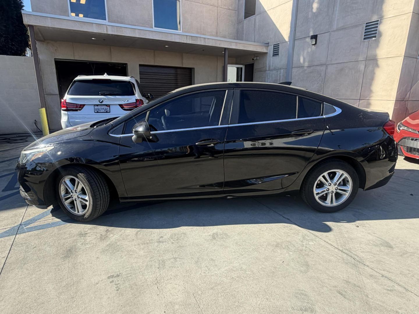 2018 Chevrolet Cruze LT Auto (1G1BE5SM4J7) with an 1.4L L4 DOHC 16V TURBO engine, 6A transmission, located at 30 S. Berkeley Avenue, Pasadena, CA, 91107, (626) 248-7567, 34.145447, -118.109398 - Crown City Motors is a used “Buy Here Pay Here” car dealer in Pasadena CA. “Buy Here Pay Here” financing, means that when you purchase your vehicle from our dealership, that you make the payments to the dealership as well. We do not need the banks approval to get you approved for a used auto - Photo#1