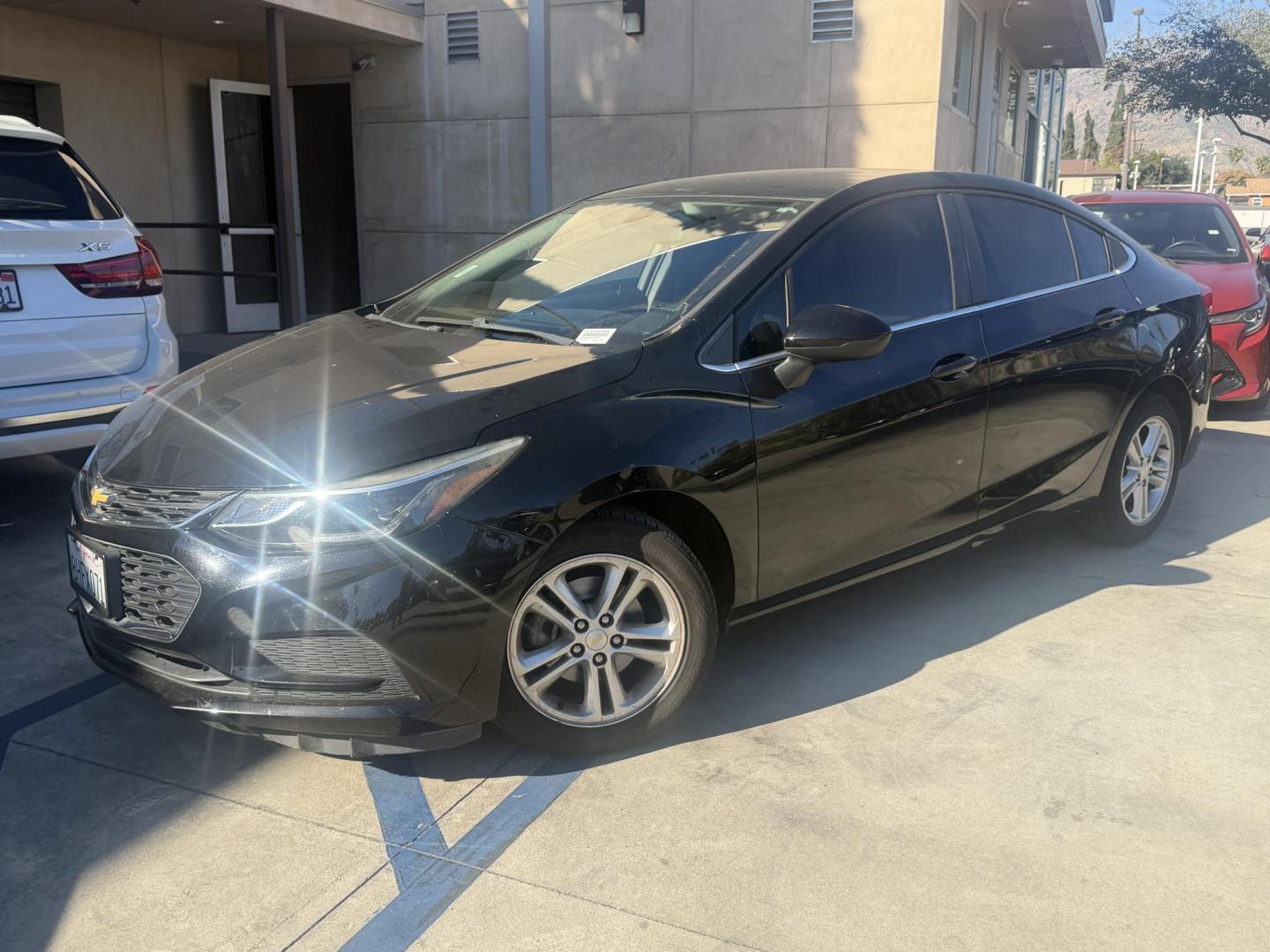 2018 Chevrolet Cruze LT Auto (1G1BE5SM4J7) with an 1.4L L4 DOHC 16V TURBO engine, 6A transmission, located at 30 S. Berkeley Avenue, Pasadena, CA, 91107, (626) 248-7567, 34.145447, -118.109398 - Crown City Motors is a used “Buy Here Pay Here” car dealer in Pasadena CA. “Buy Here Pay Here” financing, means that when you purchase your vehicle from our dealership, that you make the payments to the dealership as well. We do not need the banks approval to get you approved for a used auto - Photo#0