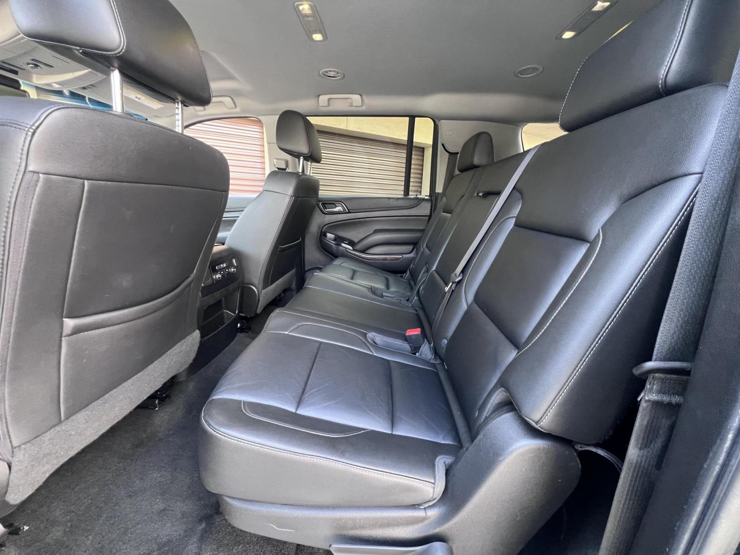 2018 BLACK /Black Chevrolet Suburban LT 2WD (1GNSCHKC6JR) with an 5.3L V8 OHV 16V engine, 6A transmission, located at 30 S. Berkeley Avenue, Pasadena, CA, 91107, (626) 248-7567, 34.145447, -118.109398 - Looking for a reliable, spacious, and powerful full-size SUV? Check out this stunning 2018 Chevrolet Suburban, available now at Crown City Motors, located at 30 S Berkeley Ave, Pasadena, CA 91107. With the VIN 1GNSCHKC6JR267945, this pre-owned Suburban is the perfect blend of luxury, performance, an - Photo#21