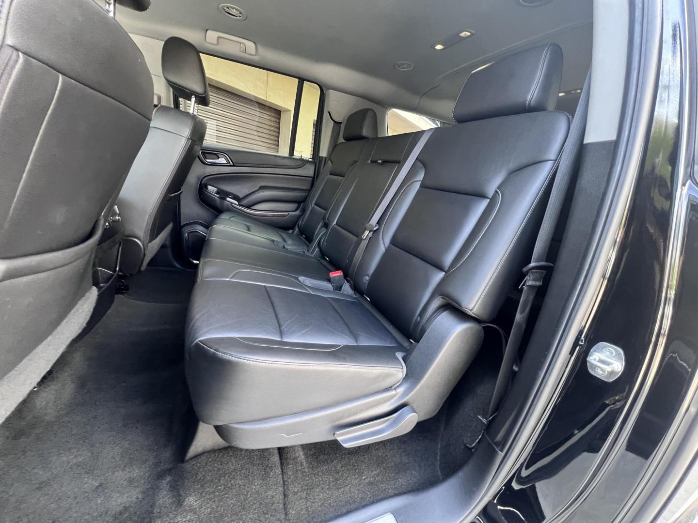 2018 BLACK /Black Chevrolet Suburban LT 2WD (1GNSCHKC6JR) with an 5.3L V8 OHV 16V engine, 6A transmission, located at 30 S. Berkeley Avenue, Pasadena, CA, 91107, (626) 248-7567, 34.145447, -118.109398 - Looking for a reliable, spacious, and powerful full-size SUV? Check out this stunning 2018 Chevrolet Suburban, available now at Crown City Motors, located at 30 S Berkeley Ave, Pasadena, CA 91107. With the VIN 1GNSCHKC6JR267945, this pre-owned Suburban is the perfect blend of luxury, performance, an - Photo#22