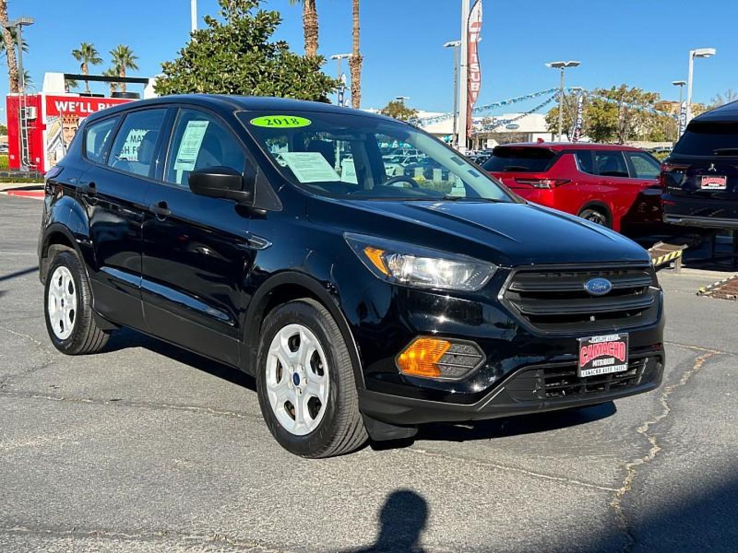 2018 BLACK Ford Escape (1FMCU0F77JU) with an 4-Cyl 2.5 Liter engine, Auto 6-Spd w/SelShft transmission, located at 412 Auto Vista Drive, Palmdale, 93551, (661) 945-0620, 34.592636, -118.136681 - Photo#1