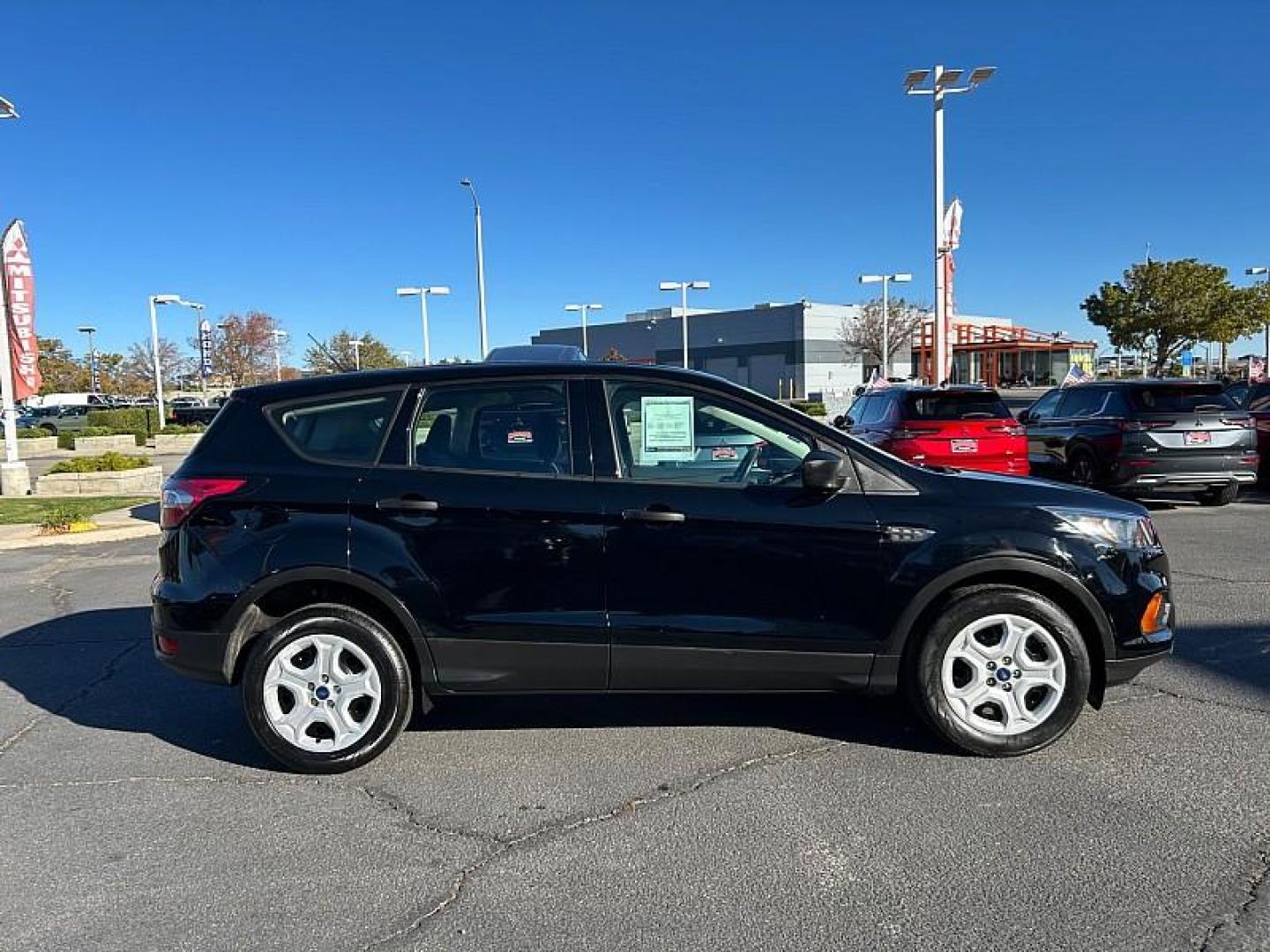 2018 BLACK Ford Escape (1FMCU0F77JU) with an 4-Cyl 2.5 Liter engine, Auto 6-Spd w/SelShft transmission, located at 412 Auto Vista Drive, Palmdale, 93551, (661) 945-0620, 34.592636, -118.136681 - Photo#4