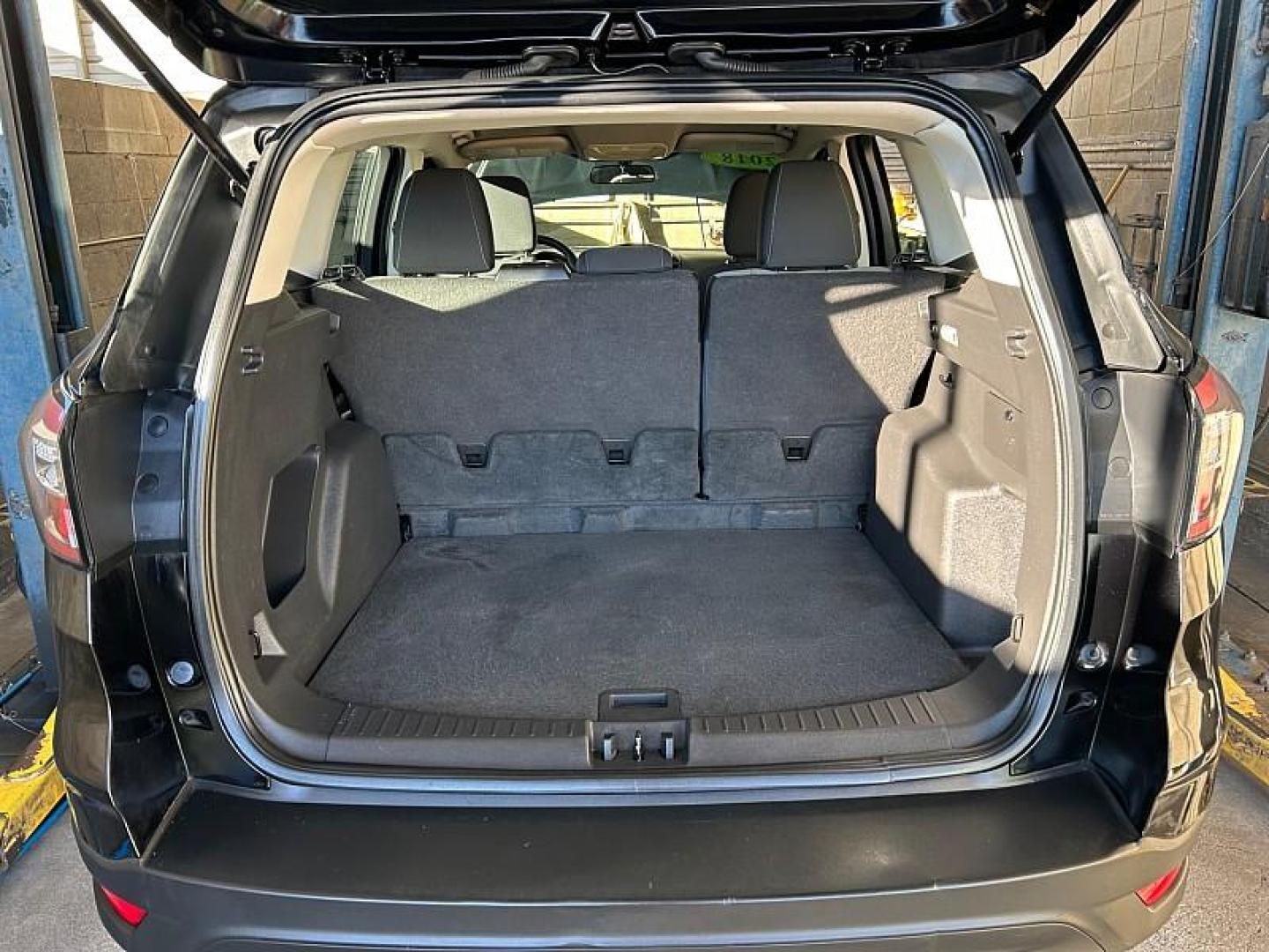 2018 BLACK Ford Escape (1FMCU0F77JU) with an 4-Cyl 2.5 Liter engine, Auto 6-Spd w/SelShft transmission, located at 412 Auto Vista Drive, Palmdale, 93551, (661) 945-0620, 34.592636, -118.136681 - Photo#12