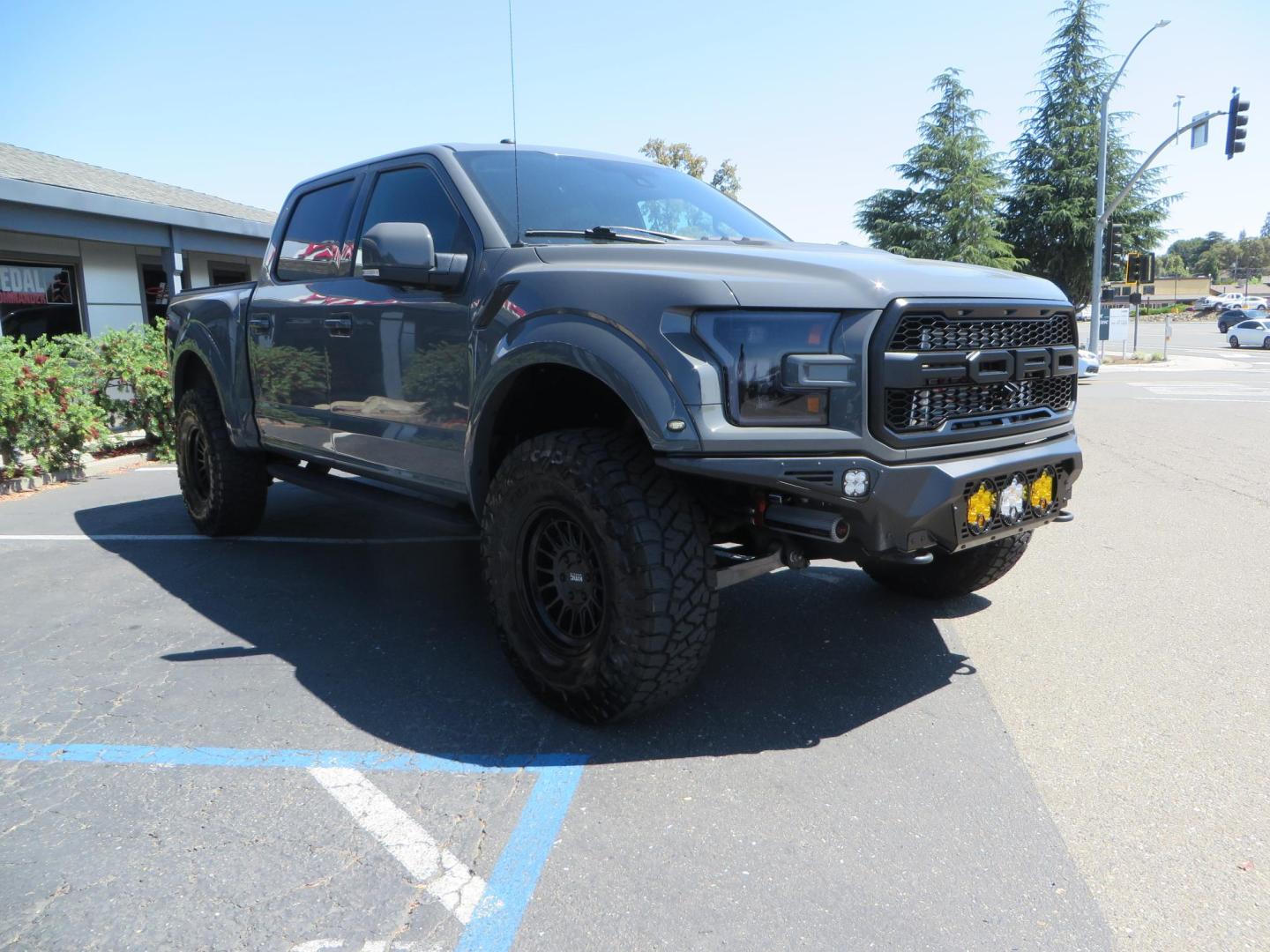 2018 Gray Ford F-150 Raptor SuperCrew 4WD (1FTFW1RG4JF) with an 3.5 V6 engine, 6A transmission, located at 2630 Grass Valley Highway, Auburn, CA, 95603, (530) 508-5100, 38.937893, -121.095482 - Must see Raptor with a bunch of new accessories. We just install Fox 3.0 live valve coilovers and rear shocks, Fox IFP rear bumps with SVC bump stop brackets, SDI E Click, Addictive Desert Designs front and rear bumpers, Baja Designs Led lighting, Addictive Desert Designs Intercooler, KMC Impact for - Photo#2