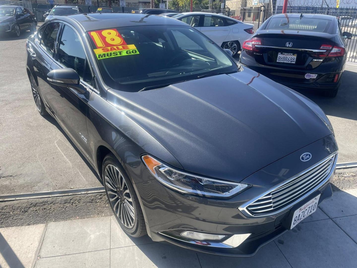 2018 Ford Fusion Energi Titanium (3FA6P0SU5JR) with an 2.0L L4 DOHC 16V HYBRID engine, CVT transmission, located at 744 E Miner Ave, Stockton, CA, 95202, (209) 944-5770, 37.956863, -121.282082 - PLUS TAXES AND FEES NO CHARGER AVAILABLE - Photo#1