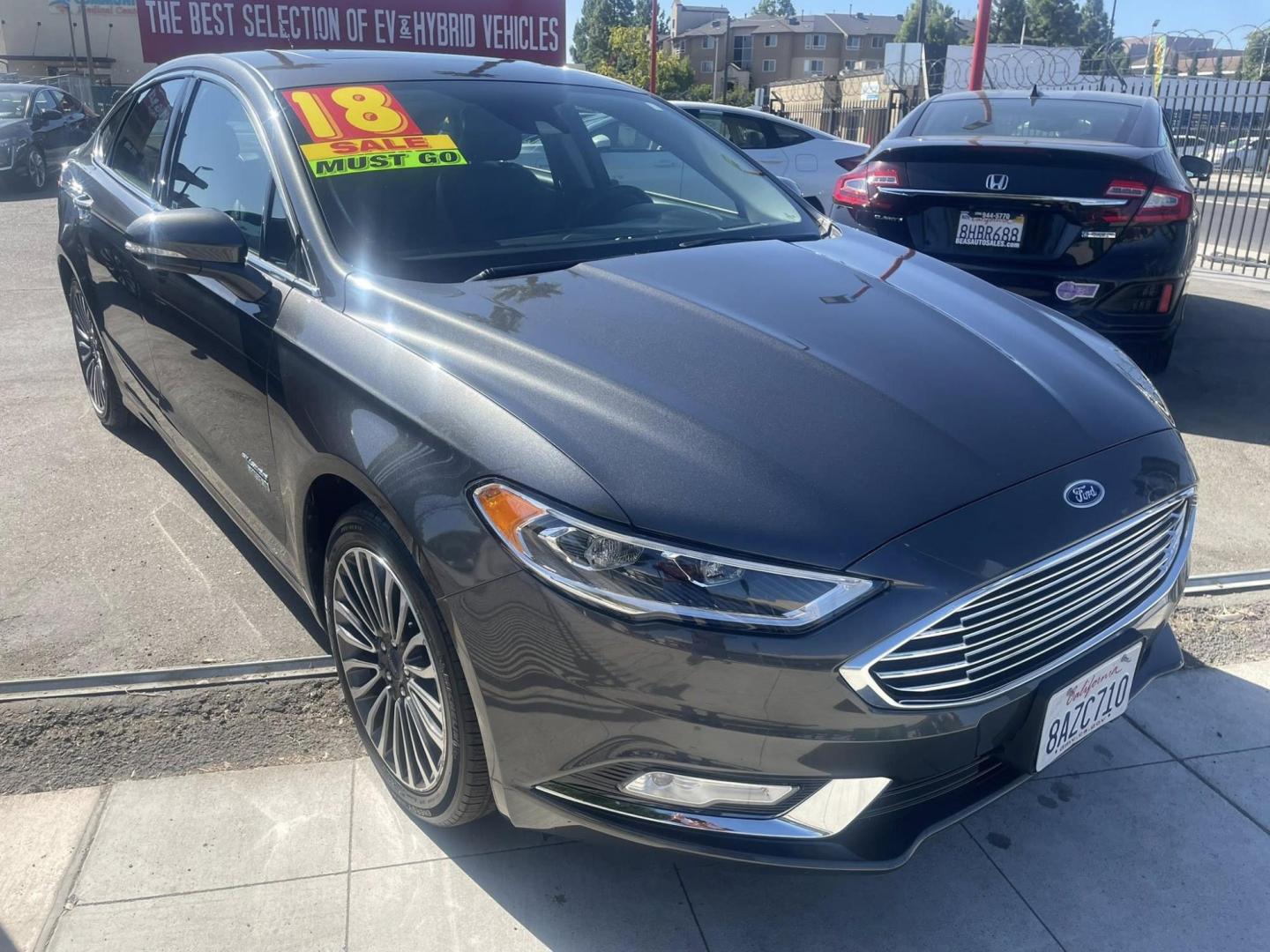 2018 Ford Fusion Energi Titanium (3FA6P0SU5JR) with an 2.0L L4 DOHC 16V HYBRID engine, CVT transmission, located at 744 E Miner Ave, Stockton, CA, 95202, (209) 944-5770, 37.956863, -121.282082 - PLUS TAXES AND FEES NO CHARGER AVAILABLE - Photo#0