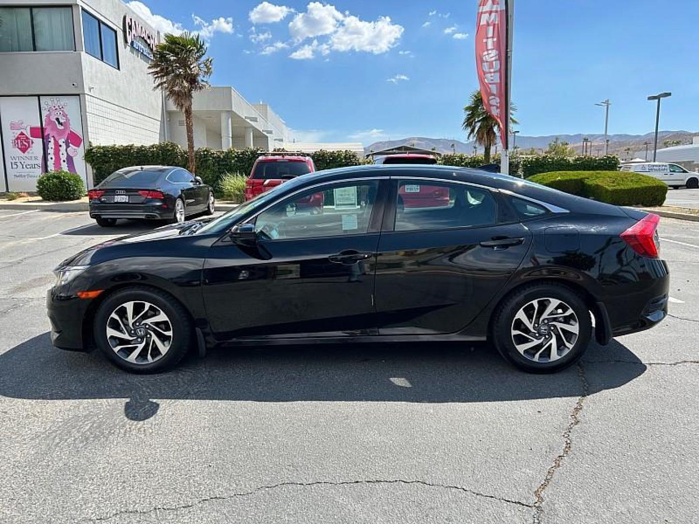 2018 BLACK Honda Civic Sedan (2HGFC2F72JH) with an 4-Cyl 2 Liter engine, Automatic CVT transmission, located at 412 Auto Vista Drive, Palmdale, 93551, (661) 945-0620, 34.592636, -118.136681 - Photo#3
