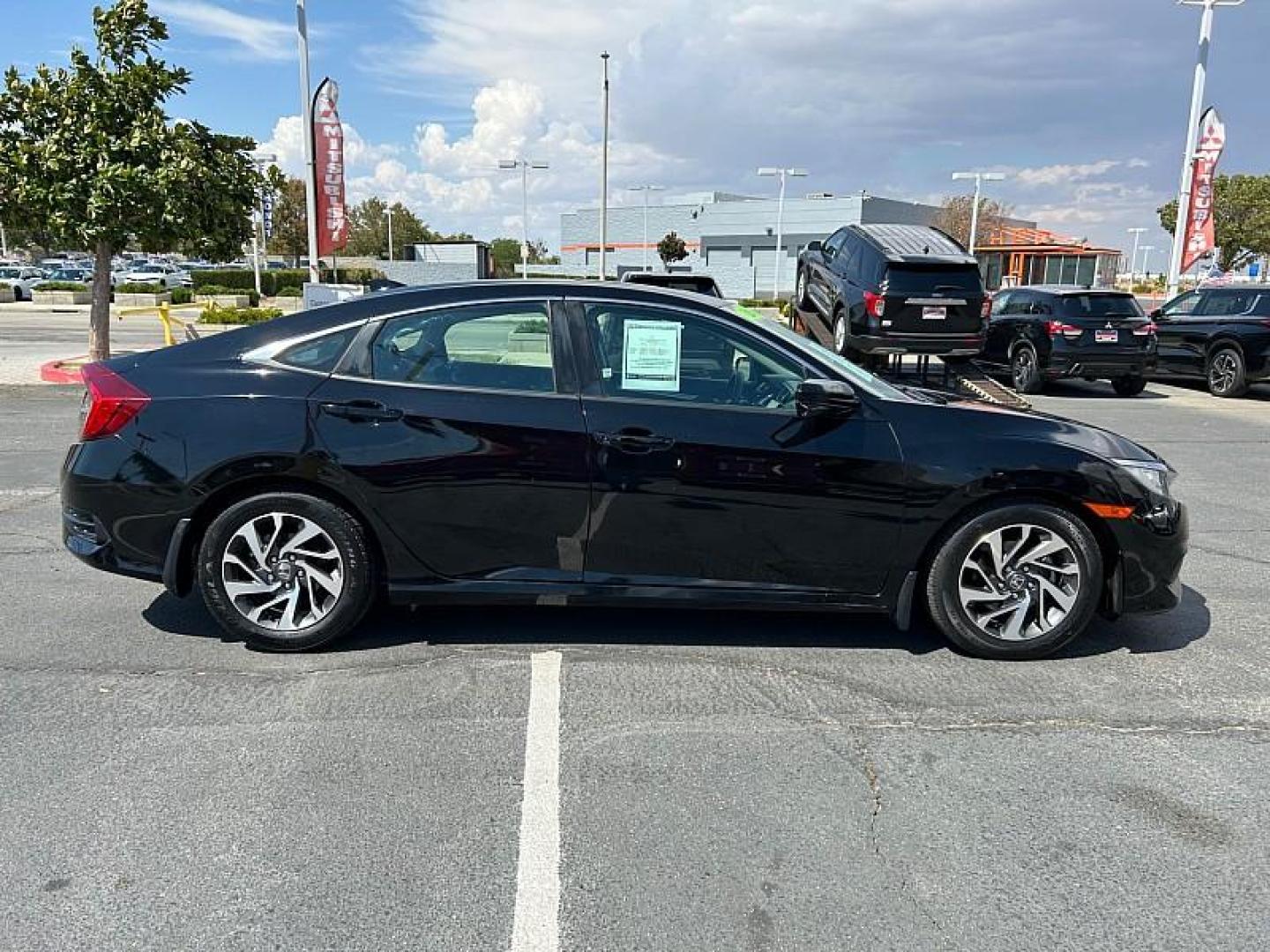 2018 BLACK Honda Civic Sedan (2HGFC2F72JH) with an 4-Cyl 2 Liter engine, Automatic CVT transmission, located at 412 Auto Vista Drive, Palmdale, 93551, (661) 945-0620, 34.592636, -118.136681 - Photo#9