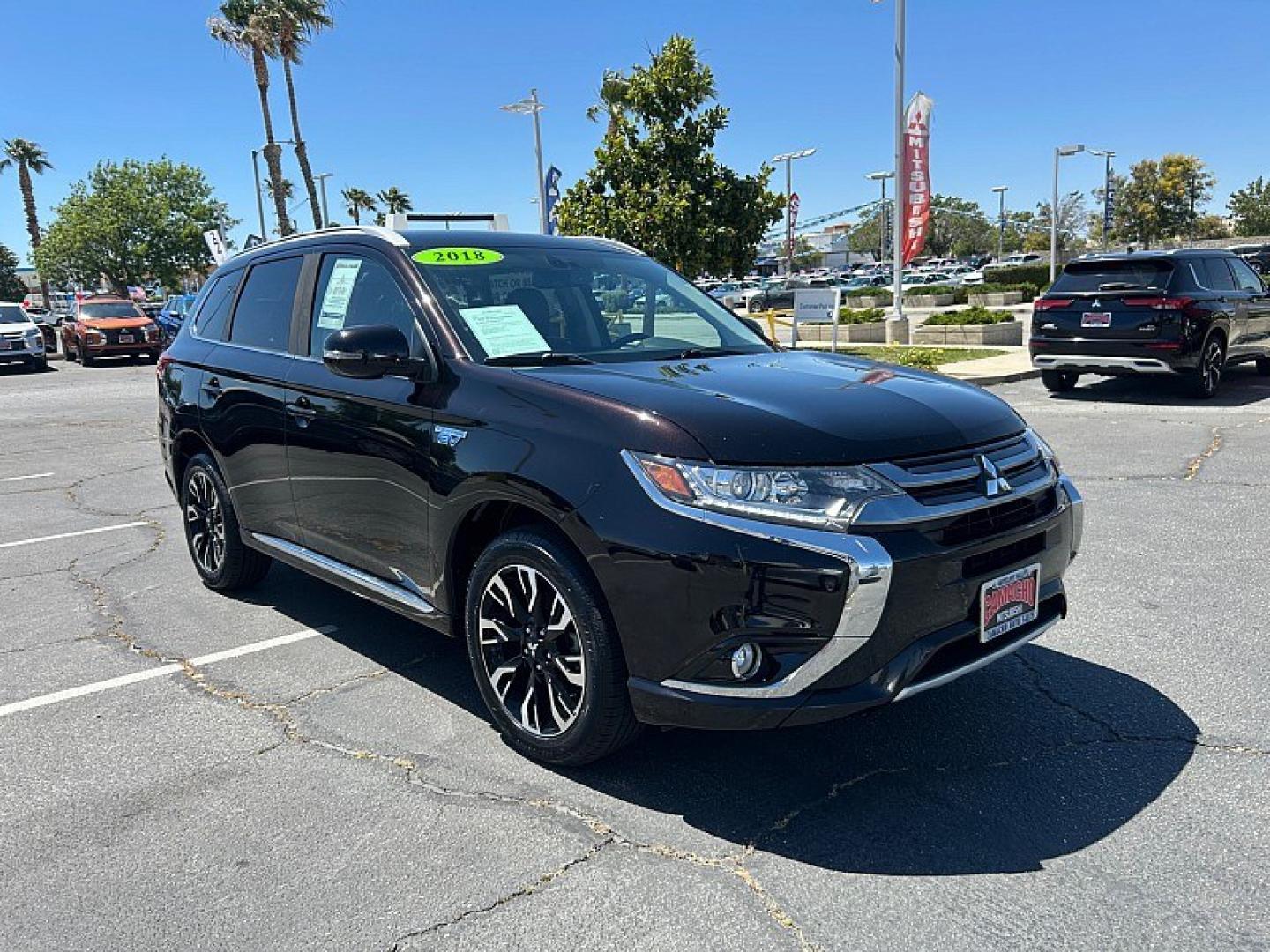 2018 RUBY BLACK Mitsubishi Outlander Plug-In Hybrid (JA4J24A58JZ) with an 4-Cyl Hybrid 2.0 Liter engine, Single-Speed Fixed Gear transmission, located at 412 Auto Vista Drive, Palmdale, 93551, (661) 945-0620, 34.592636, -118.136681- Photo#0