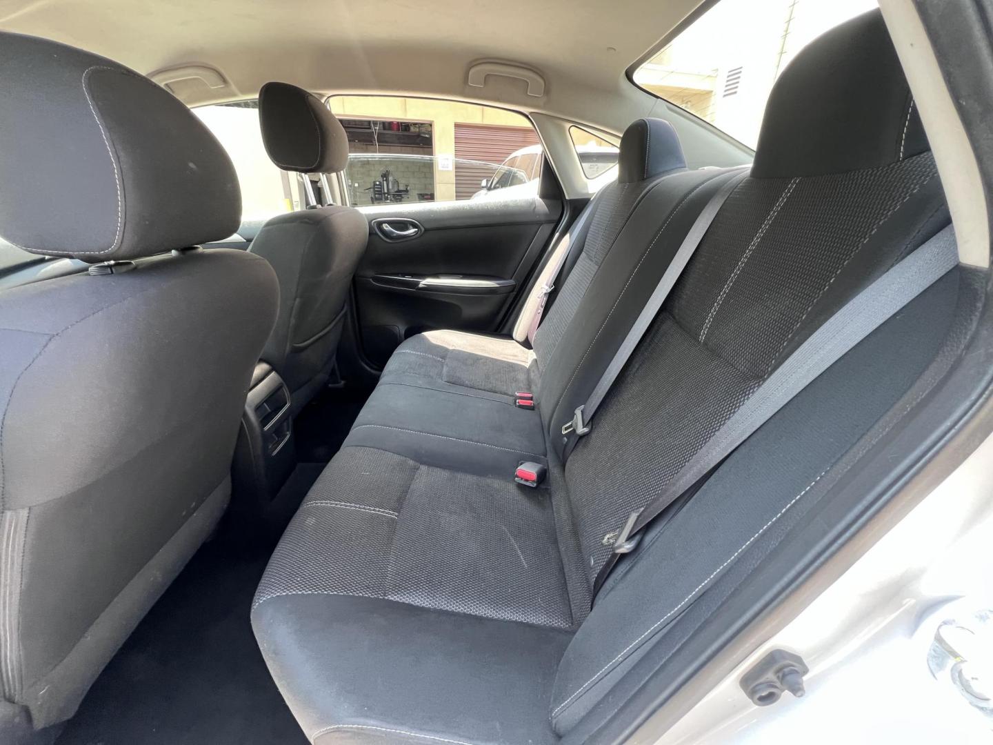 2018 SILVER Nissan Sentra S CVT (3N1AB7AP0JY) with an 1.8L L4 SFI DOHC 16V engine, CVT transmission, located at 30 S. Berkeley Avenue, Pasadena, CA, 91107, (626) 248-7567, 34.145447, -118.109398 - Crown City Motors is a used “Buy Here Pay Here” car dealer in Pasadena CA. “Buy Here Pay Here” financing, means that when you purchase your vehicle from our dealership, that you make the payments to the dealership as well. We do not need the banks approval to get you approved for a used auto - Photo#7