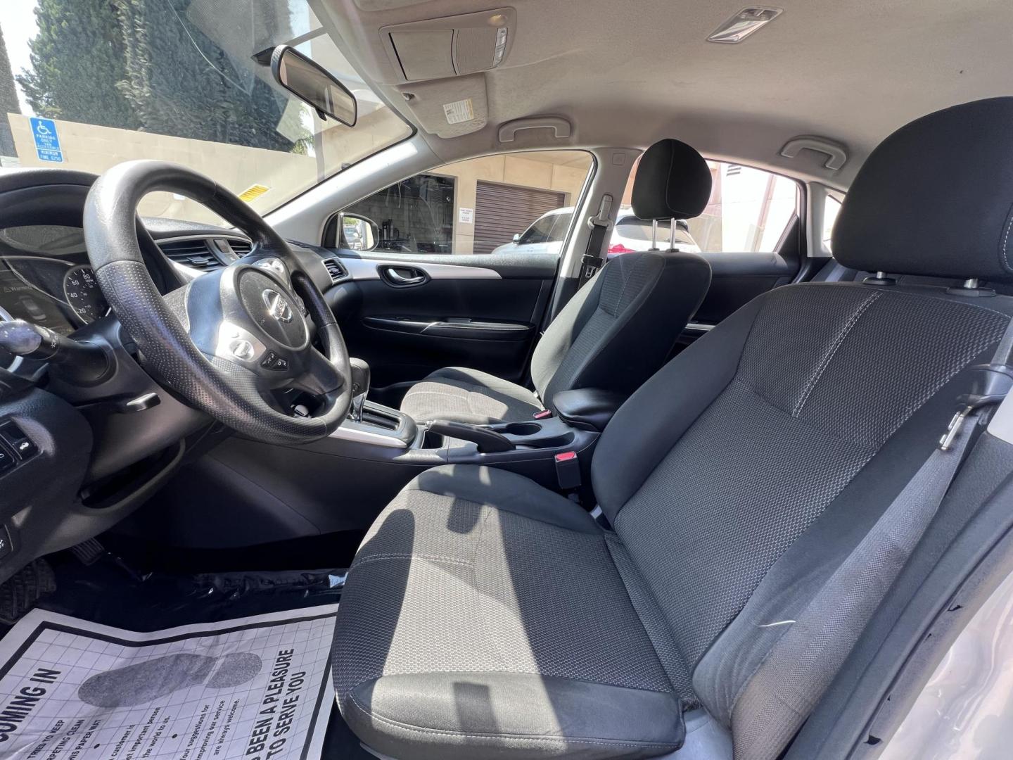 2018 SILVER Nissan Sentra S CVT (3N1AB7AP0JY) with an 1.8L L4 SFI DOHC 16V engine, CVT transmission, located at 30 S. Berkeley Avenue, Pasadena, CA, 91107, (626) 248-7567, 34.145447, -118.109398 - Crown City Motors is a used “Buy Here Pay Here” car dealer in Pasadena CA. “Buy Here Pay Here” financing, means that when you purchase your vehicle from our dealership, that you make the payments to the dealership as well. We do not need the banks approval to get you approved for a used auto - Photo#9