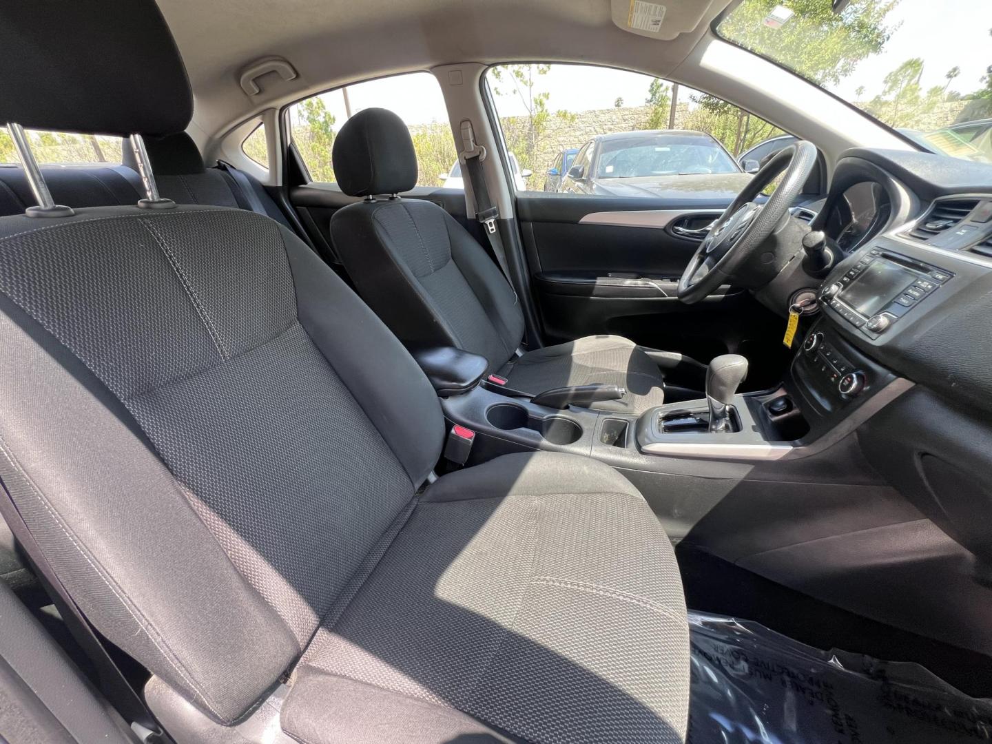 2018 SILVER Nissan Sentra S CVT (3N1AB7AP0JY) with an 1.8L L4 SFI DOHC 16V engine, CVT transmission, located at 30 S. Berkeley Avenue, Pasadena, CA, 91107, (626) 248-7567, 34.145447, -118.109398 - Crown City Motors is a used “Buy Here Pay Here” car dealer in Pasadena CA. “Buy Here Pay Here” financing, means that when you purchase your vehicle from our dealership, that you make the payments to the dealership as well. We do not need the banks approval to get you approved for a used auto - Photo#15